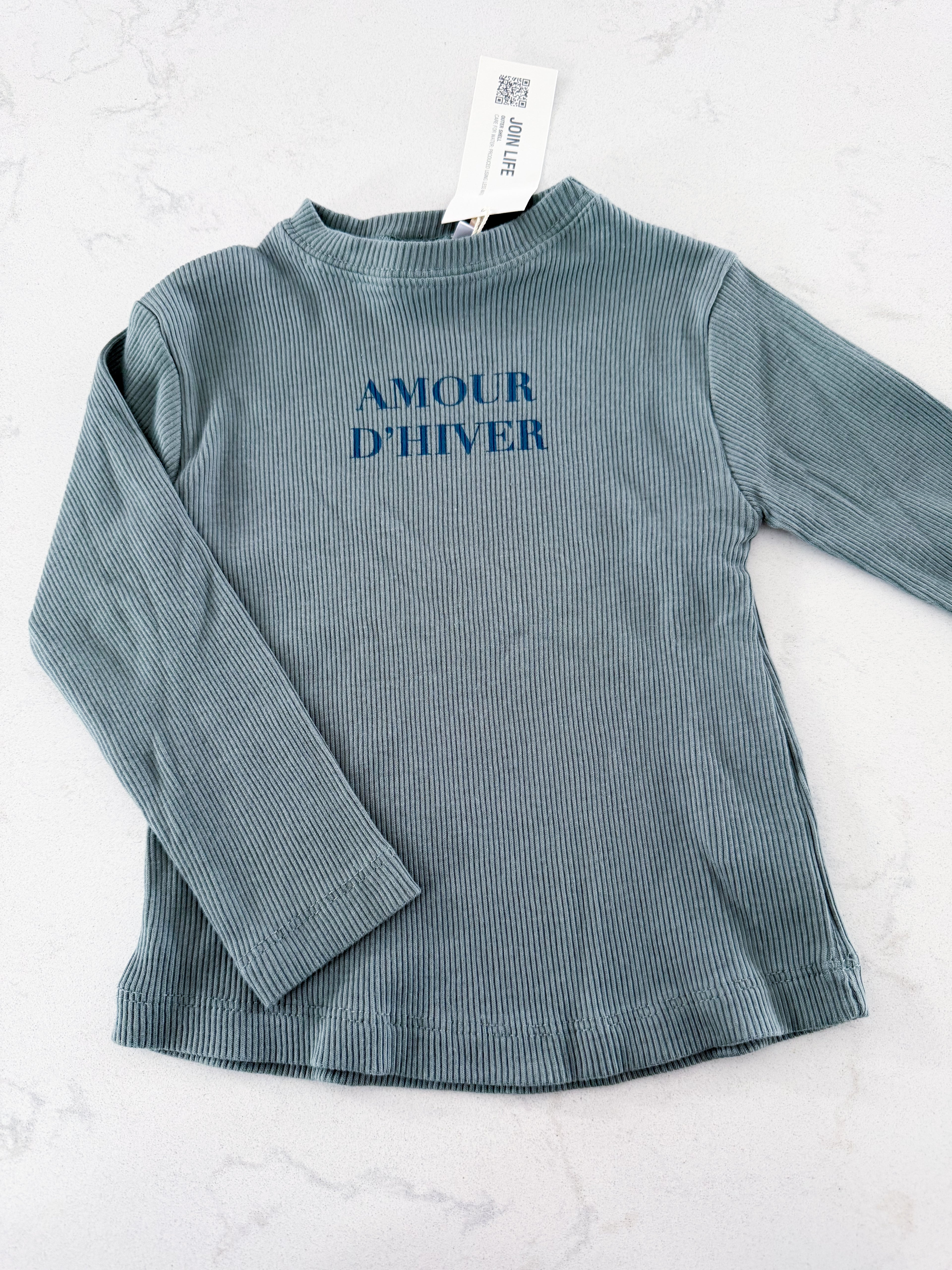 Zara- 9-12m- BNWT- greenish blue ribbed long sleeve with « amour d’hiver »