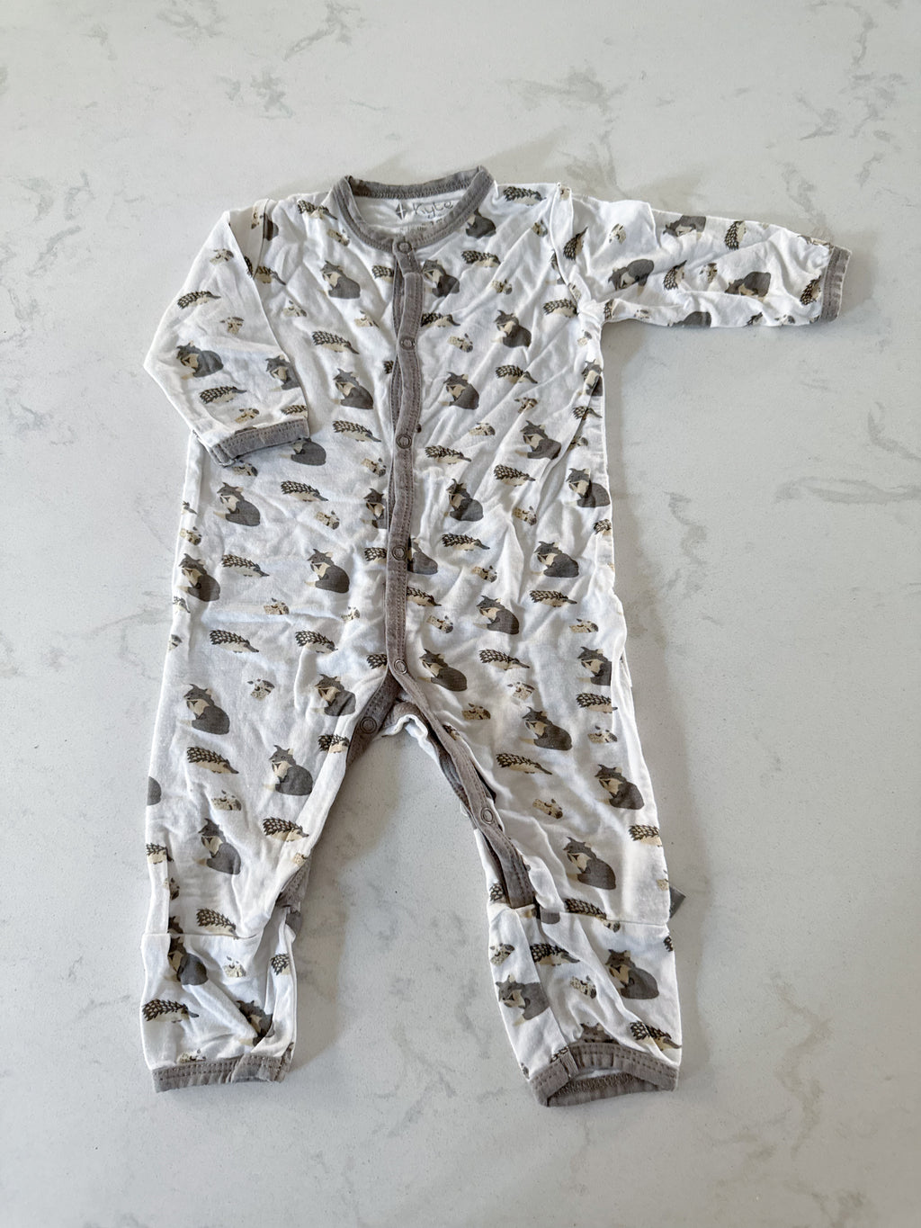 Kyte Baby- 0-3m- GUC- button up bamboo footless pajamas. White with woodland creatures