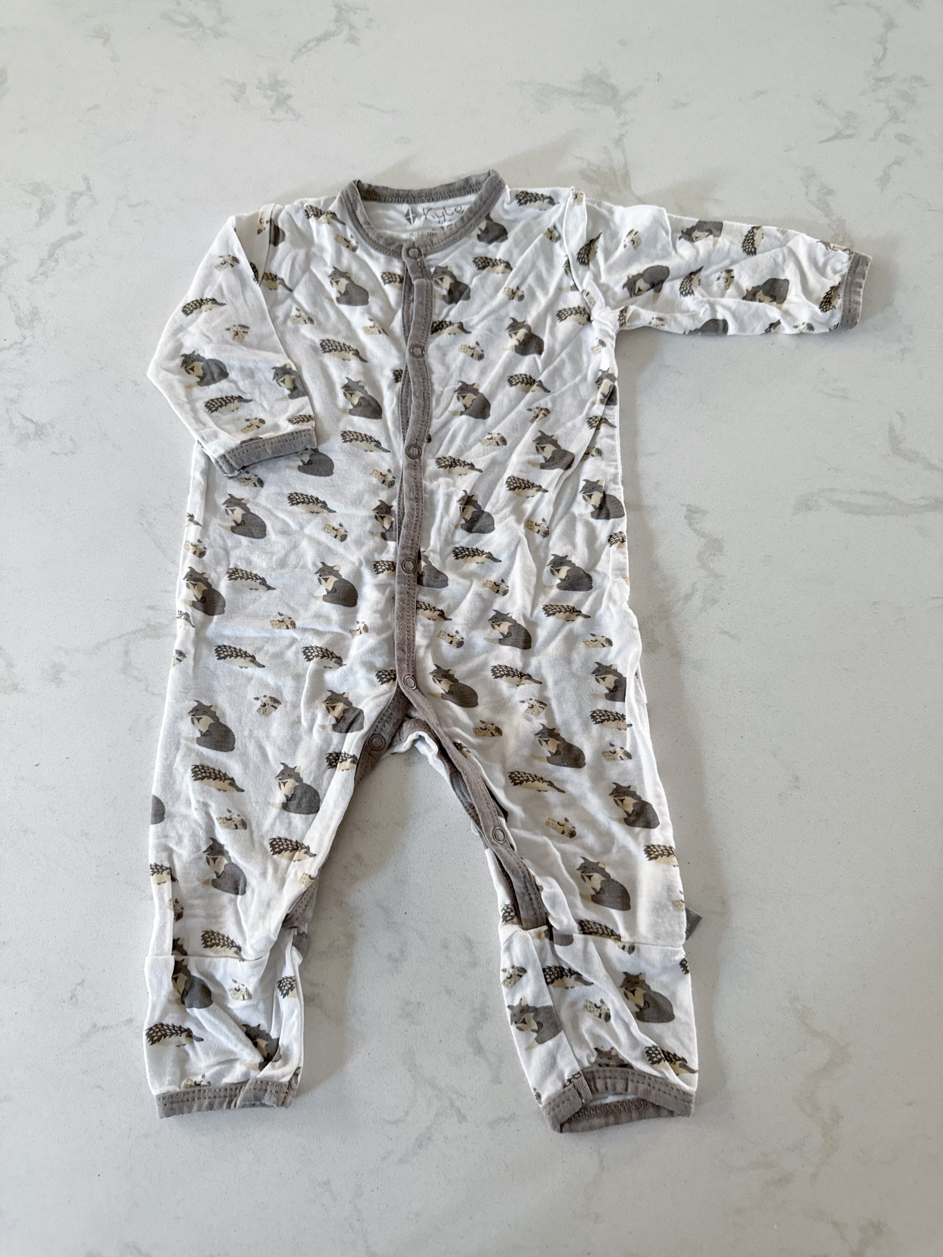 Kyte Baby- 0-3m- GUC- button up bamboo footless pajamas. White with woodland creatures