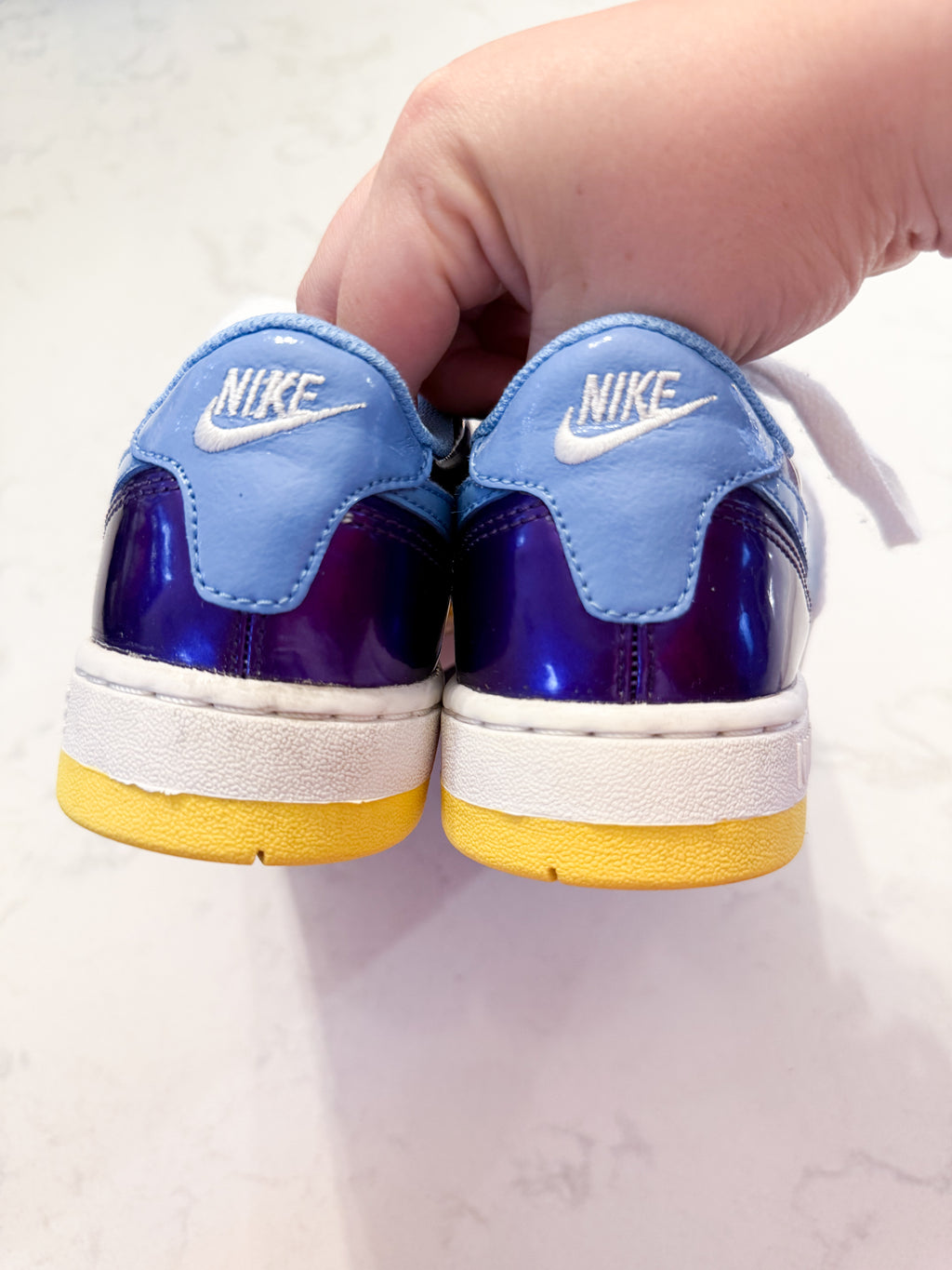 Nike- 4Y- GUC- White pink purple yellow and blue shoes with laces