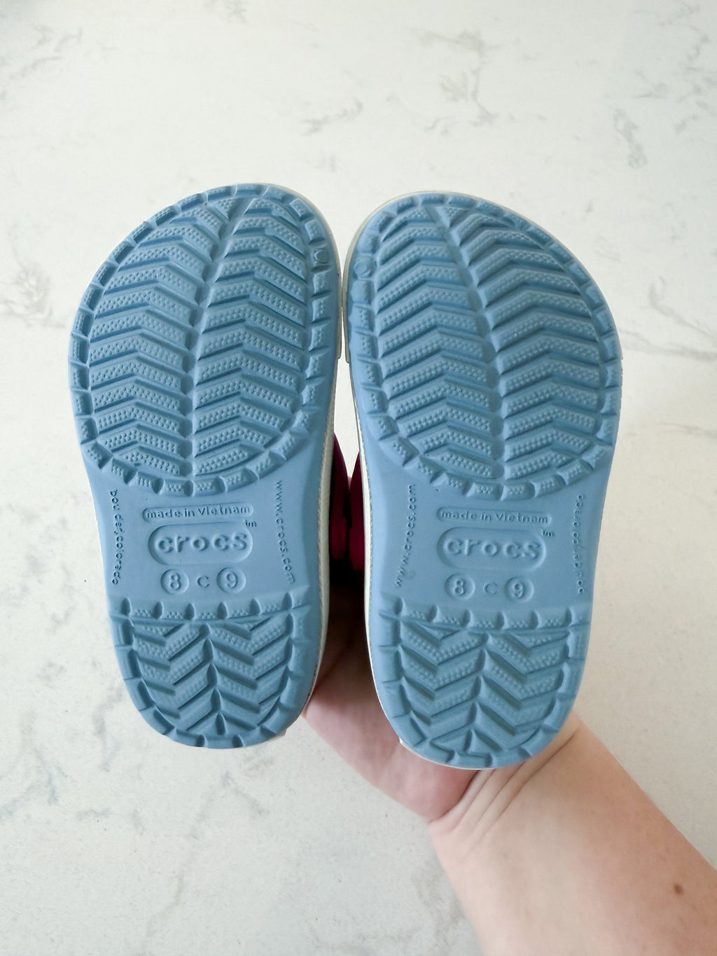 Crocs- 8/9C- GUC- light blue slip on crocs with pink florals