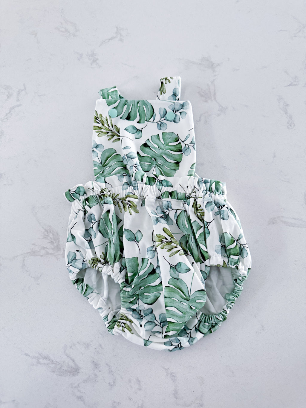 J’s- 3-6m- EUC- small-shop bubble romper overall style with tropical leaves