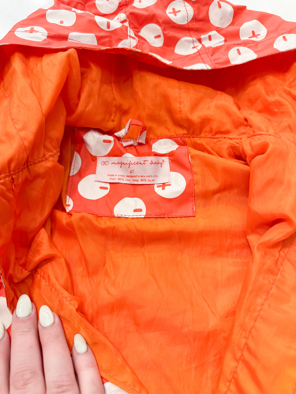 Magnificent baby- 4T (fits 5T)- play- orange positive negative charge pattern raincoat with magnetic buttons