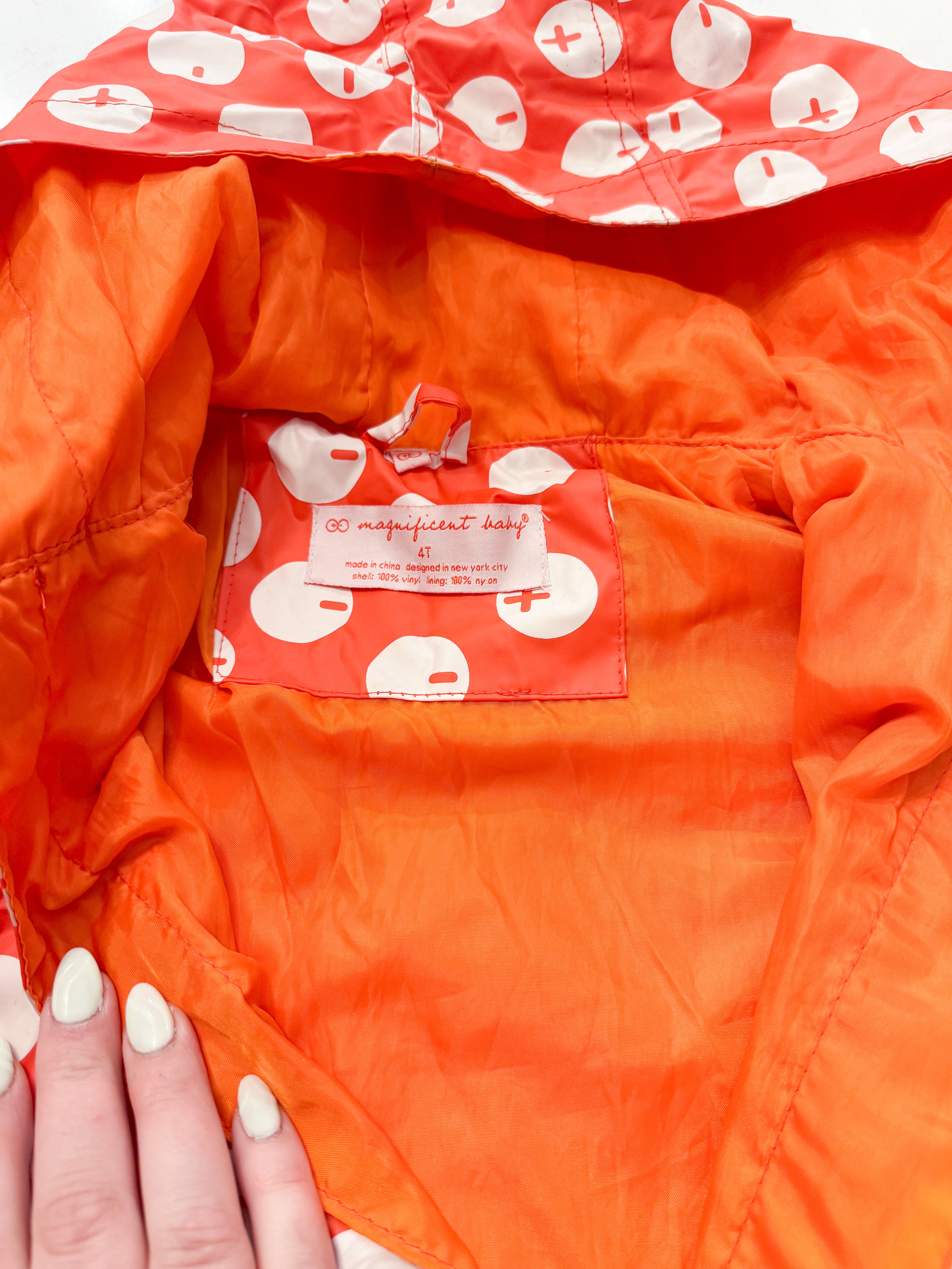 Magnificent baby- 4T (fits 5T)- play- orange positive negative charge pattern raincoat with magnetic buttons