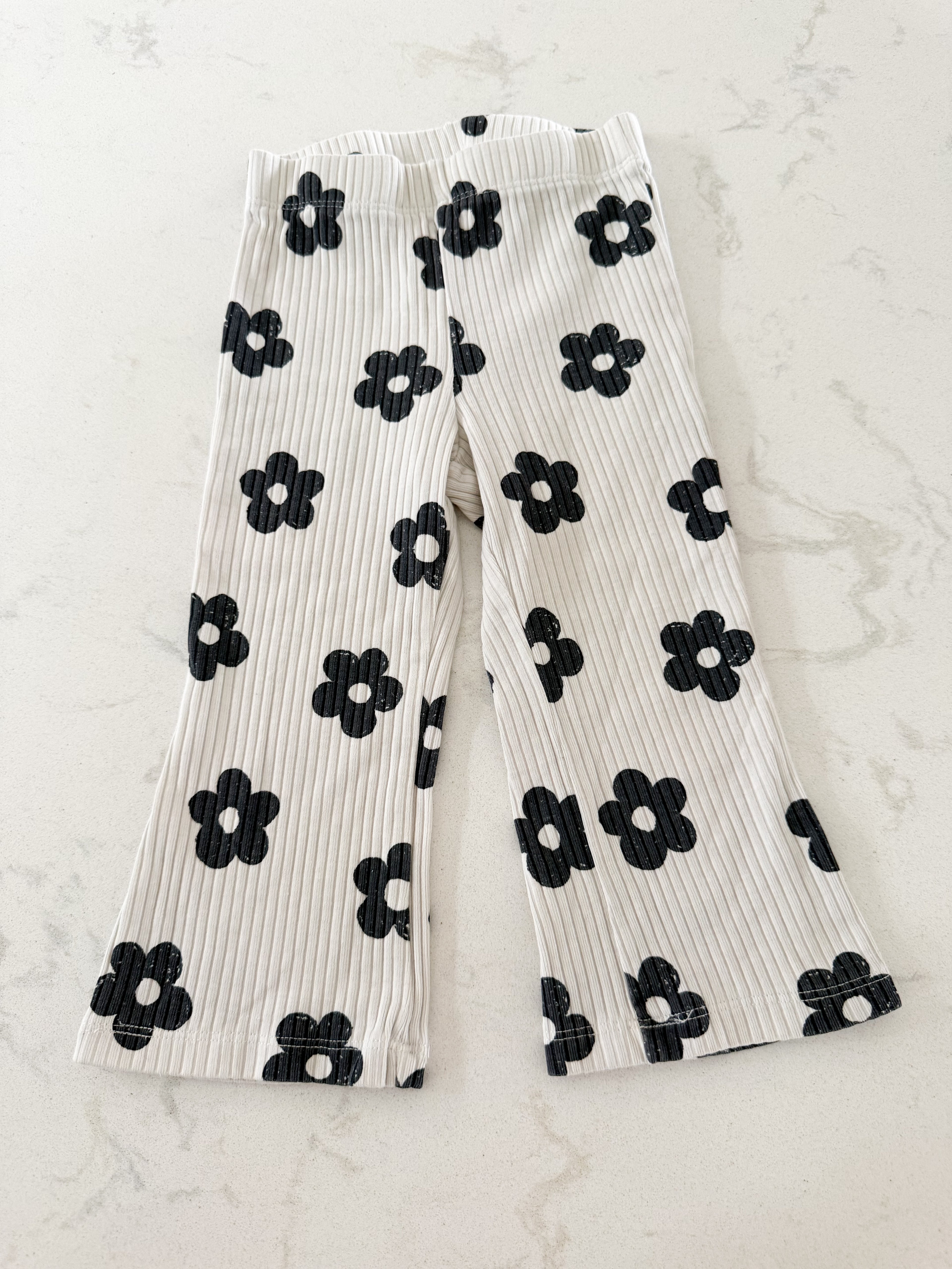 George- 12-18m- GUC- cream flare ribbed leggings with black flowers