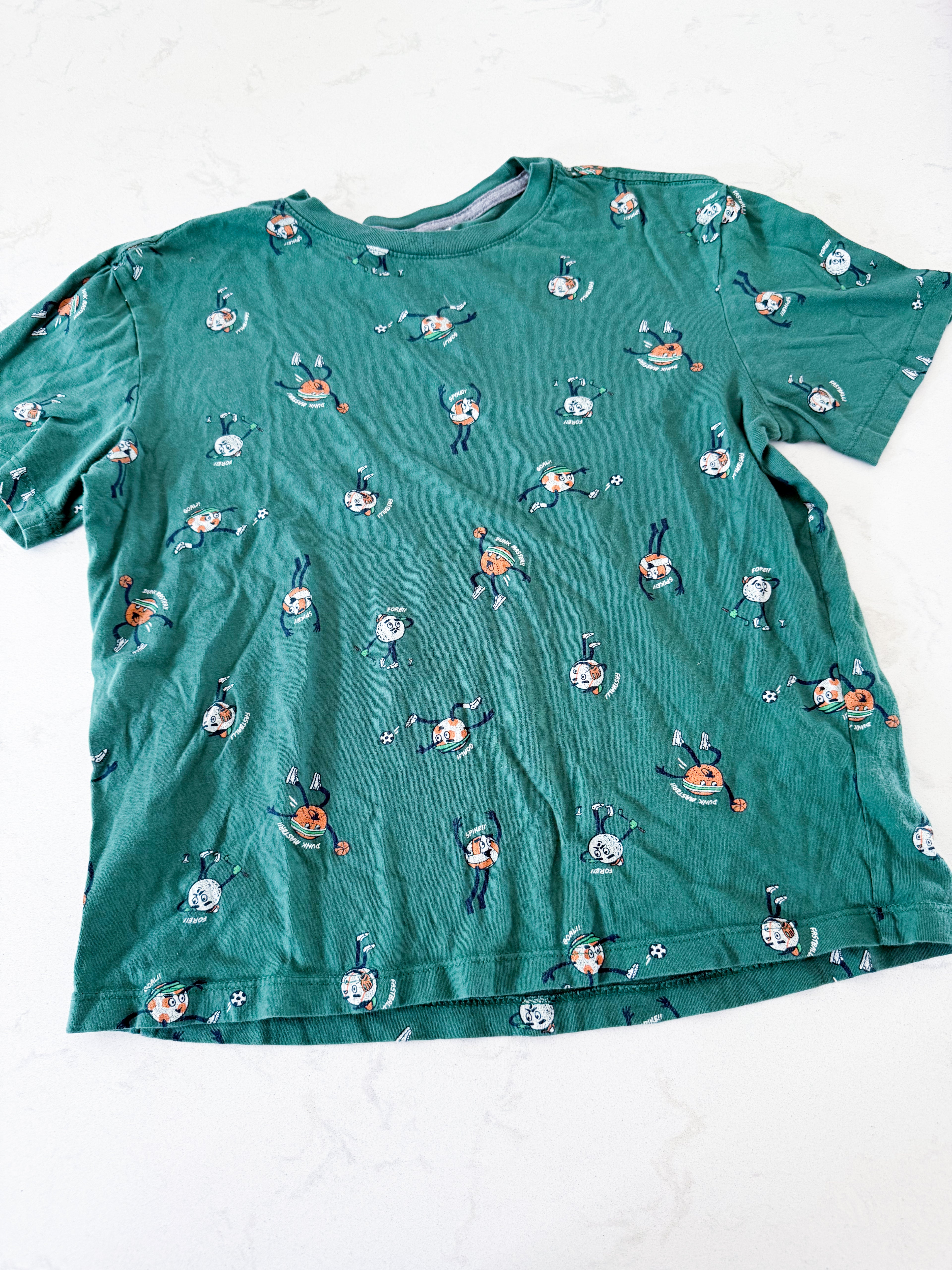 Old Navy- 10-12Y- GUC- green t shirt with sports ball characters all over