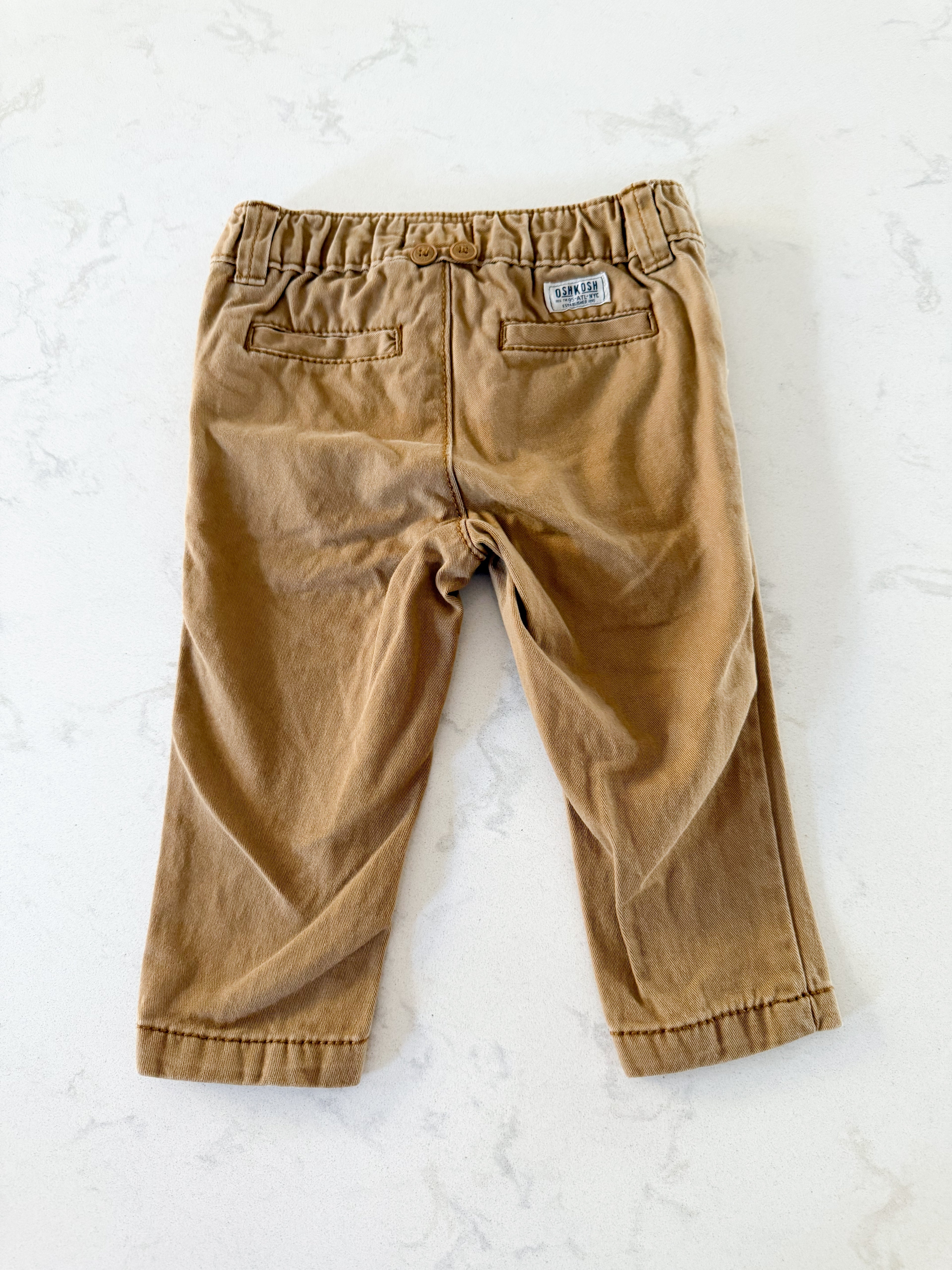 Oshkosh- 6-9m- GUC- beige khaki pants with buttons for suspender attachment