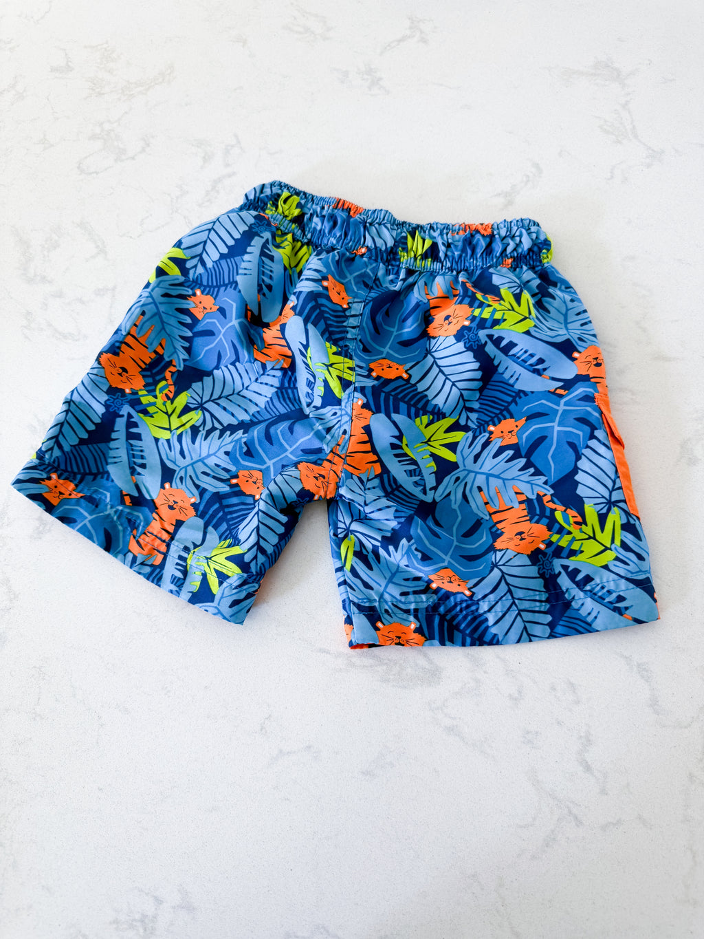 UV Skinz- 2T- VGUC- blue tropical leaf swim trunks with orange tigers