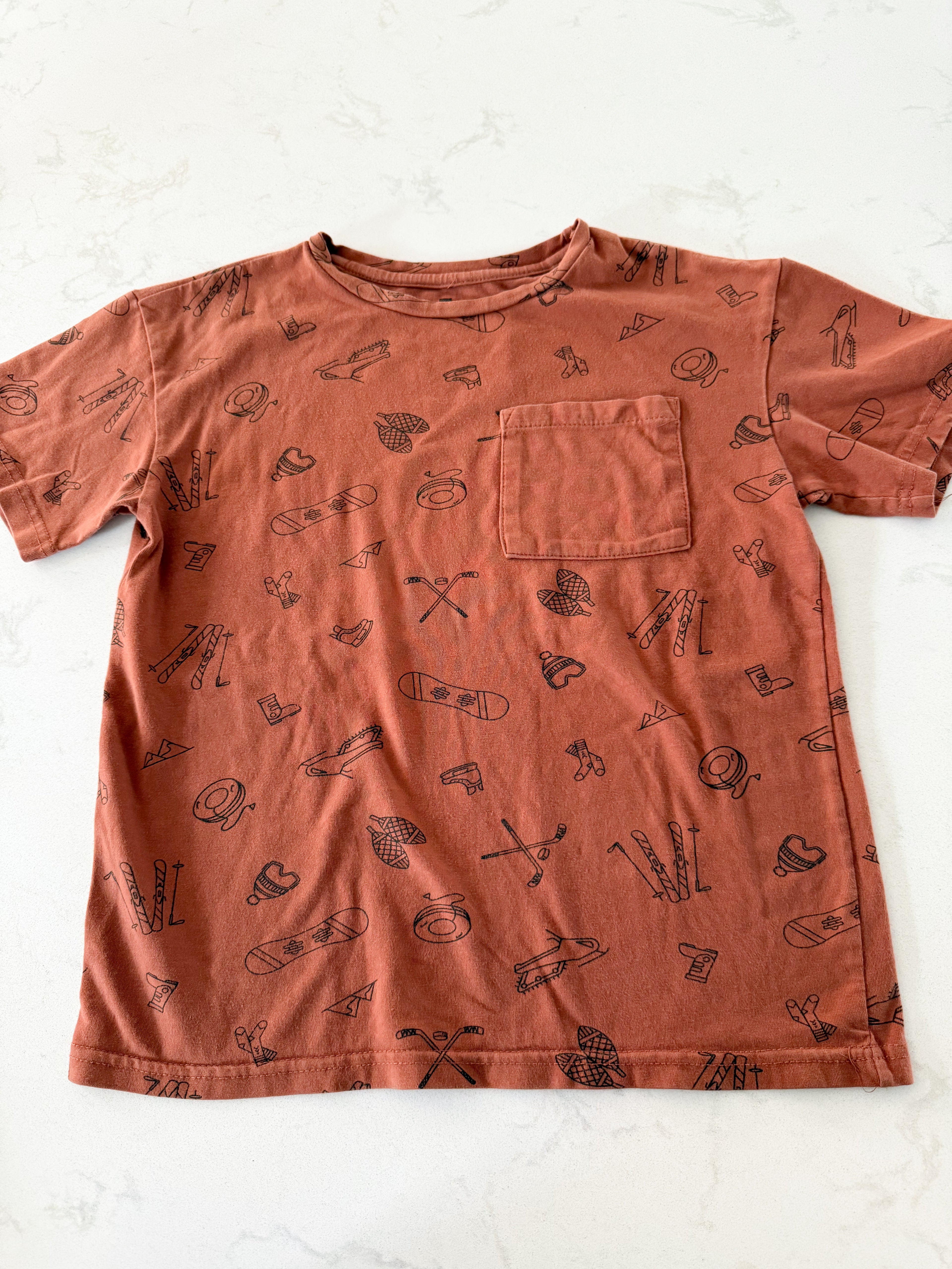 Tag- 6-7Y- GUC- Brown t shirt with winter sport graphics
