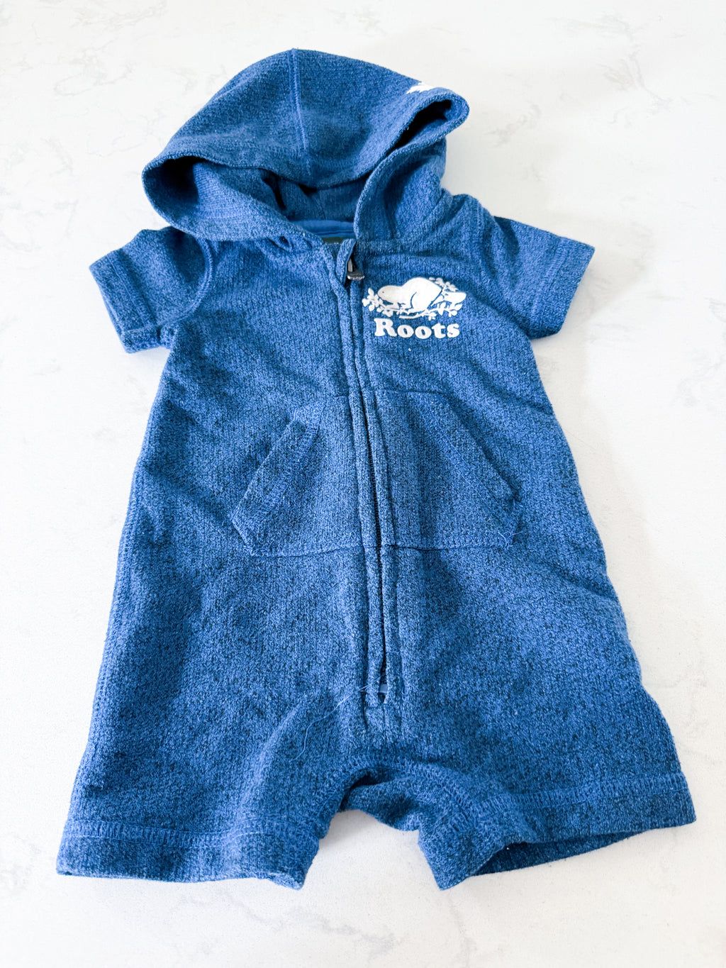 Roots- 0-3m- VGUC- medium blue short sweater romper with hood