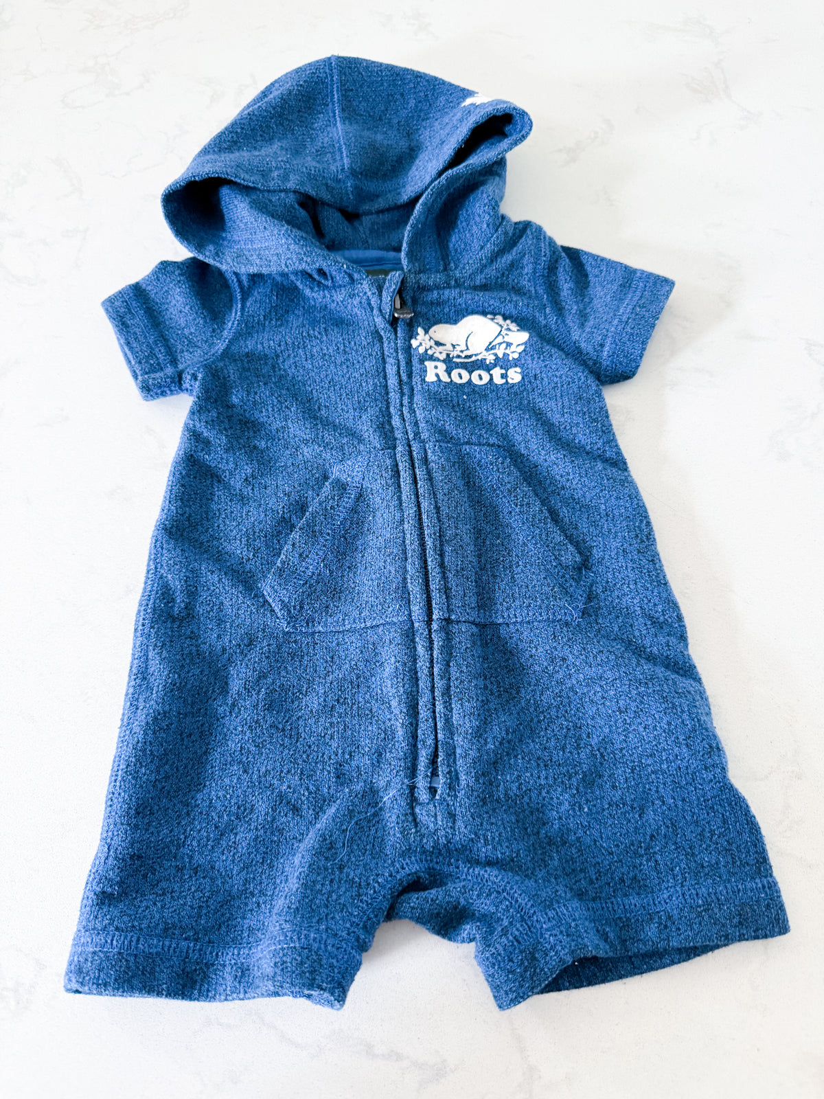 Roots- 0-3m- VGUC- medium blue short sweater romper with hood