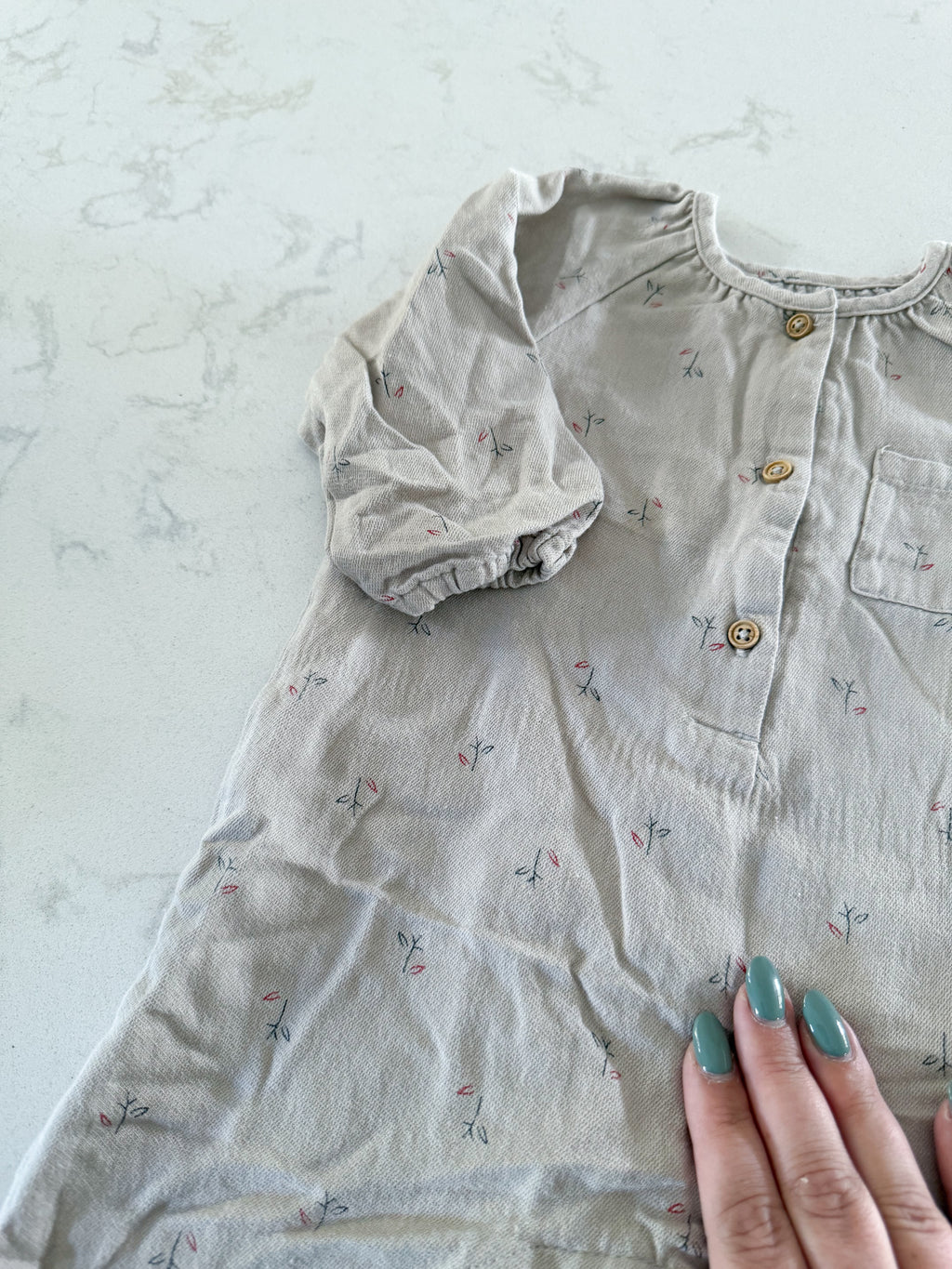 Zara-9-12m- GUC- beige/grey one piece with minimalist floral pattern