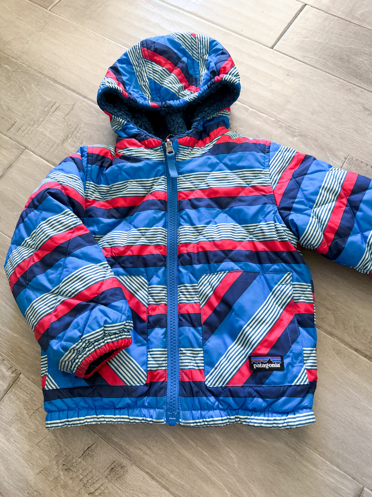 Patagonia- 3T- GUC- reversible blue red and white puffer jacket with thick fleece lining