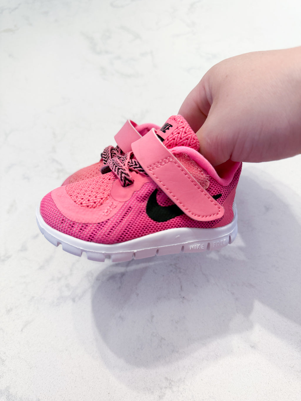 Nike- 2C- VGUC- hot pink sneakers with black symbol