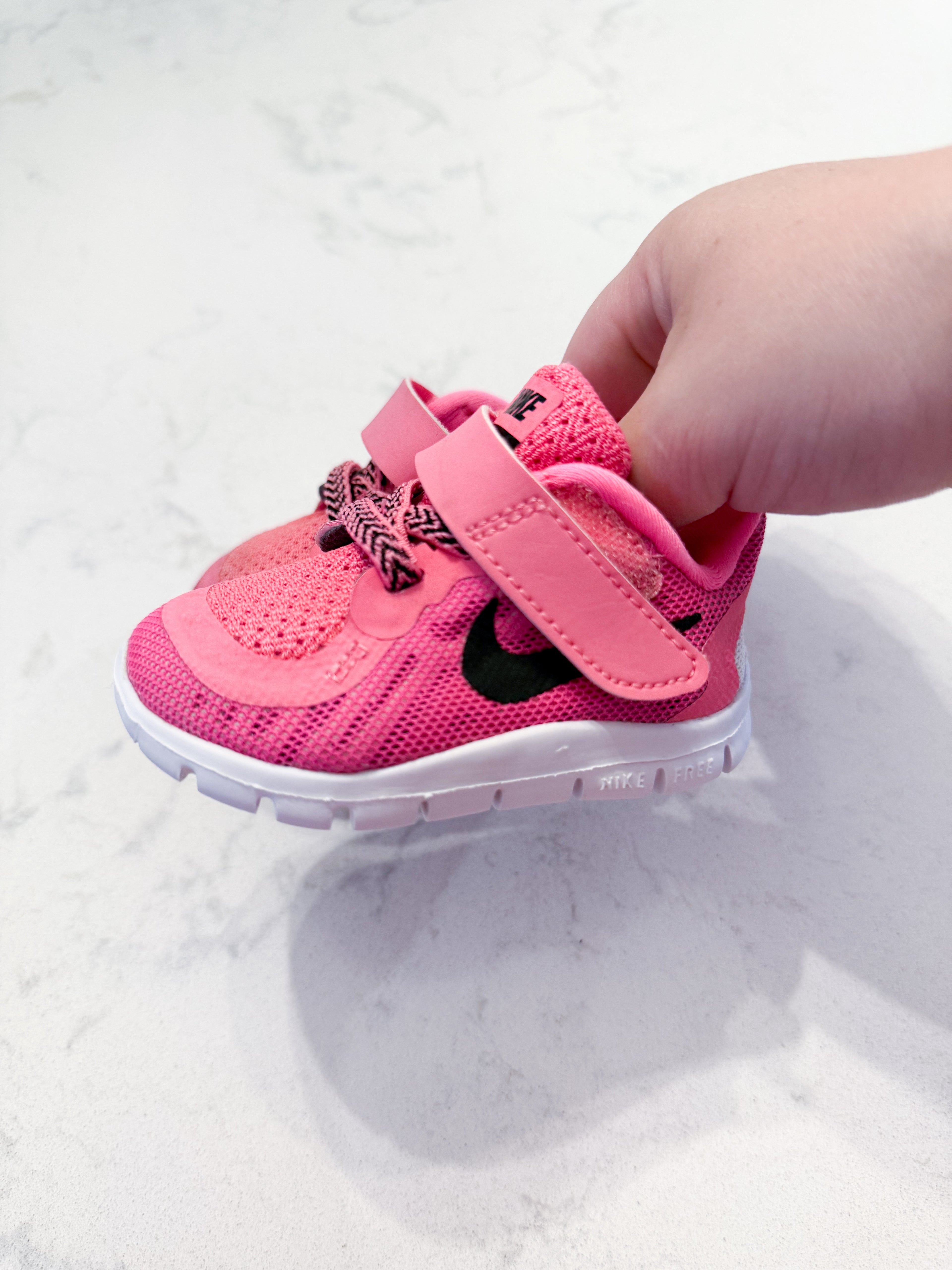 Nike- 2C- VGUC- hot pink sneakers with black symbol