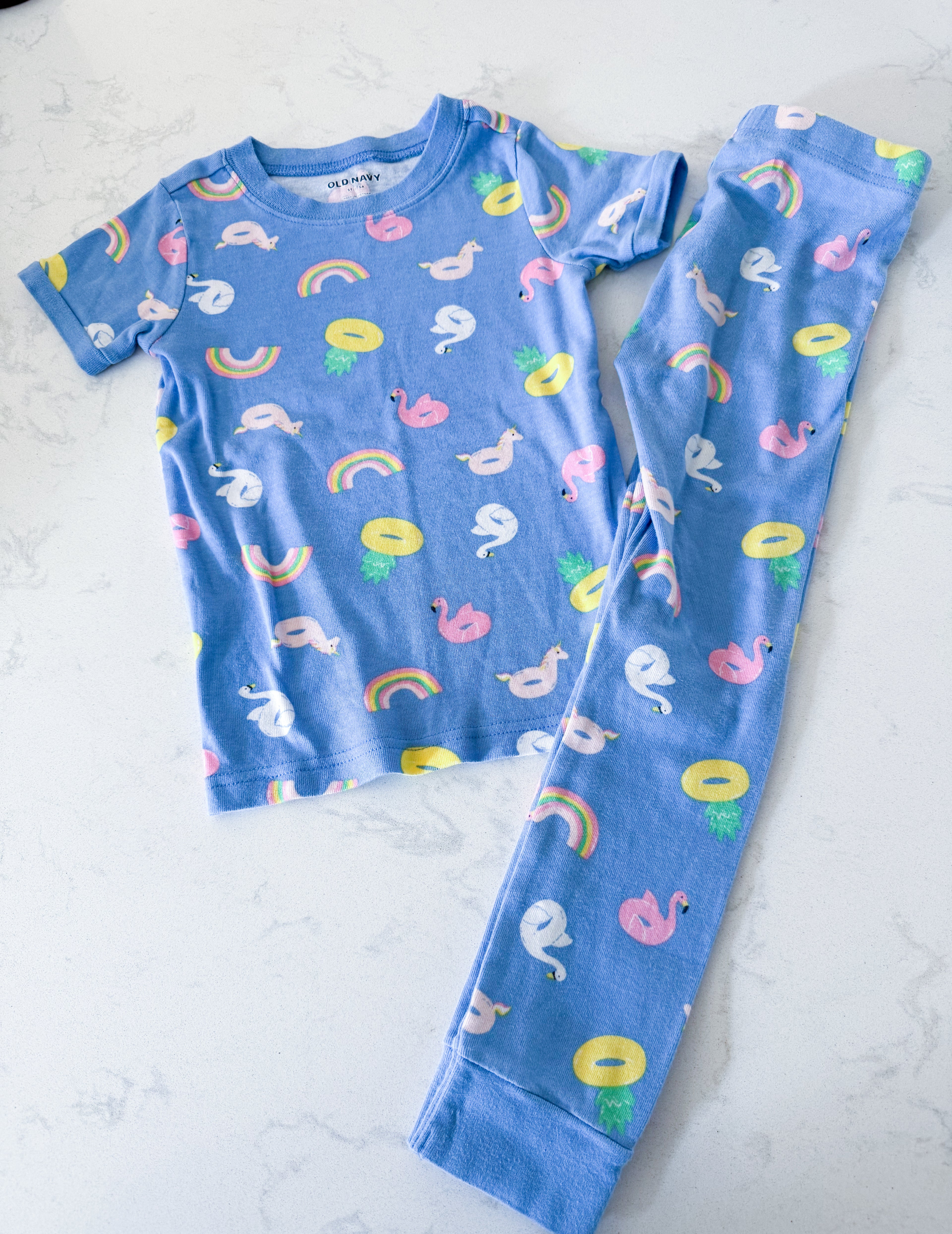 Old Navy- 5T- VGUC- blue two piece short sleeve jammies with pool floatie pattern
