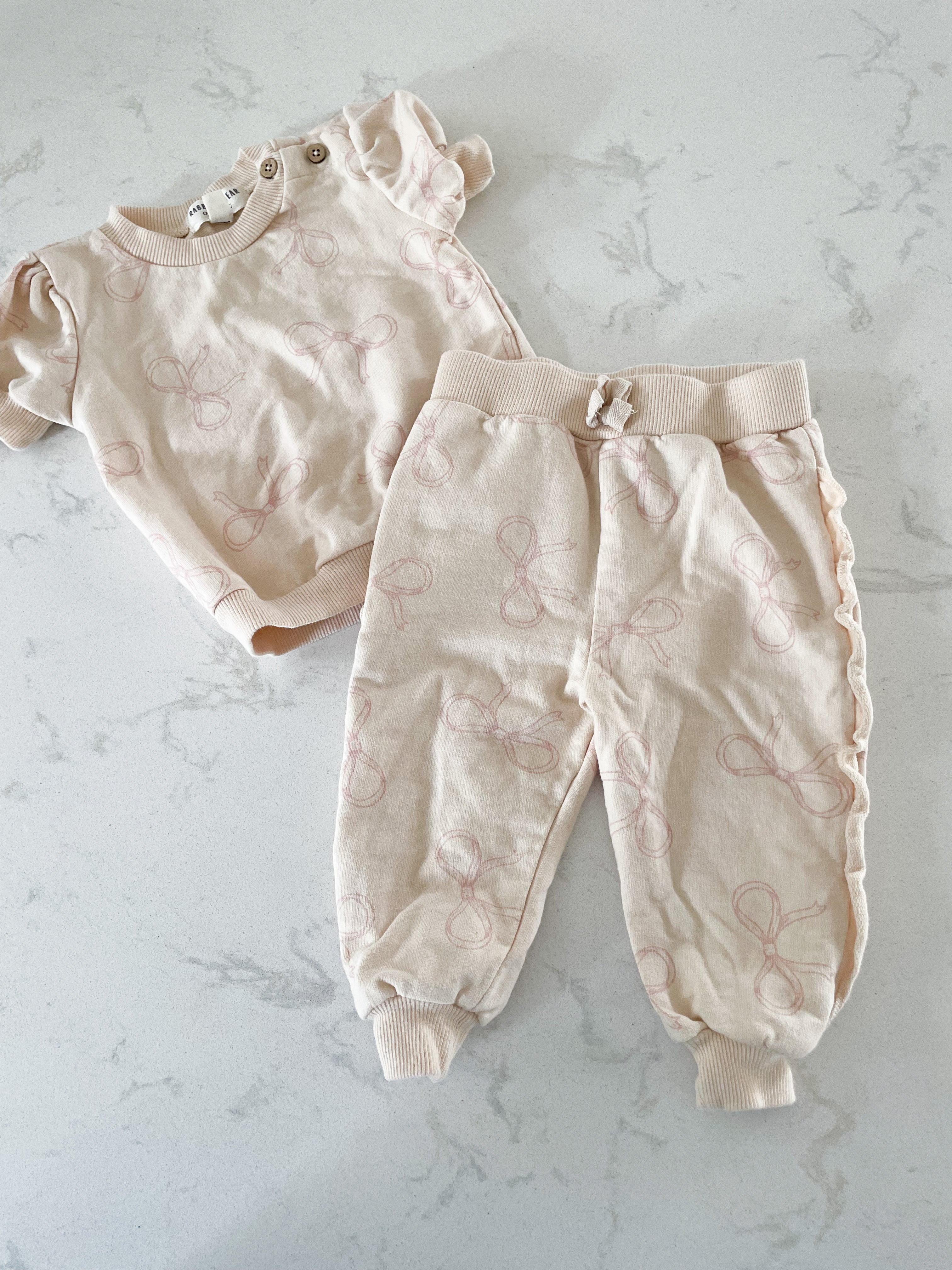 Rabbit and Bear- 6-9 months- two piece sweat set. Short sleeve with bow graphics