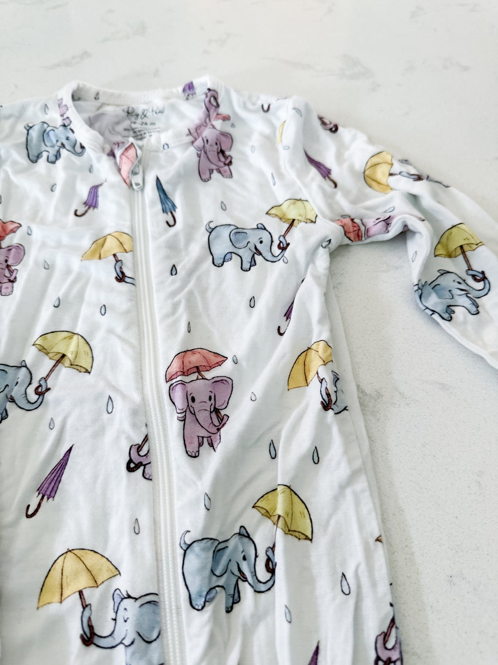 Ry and Pen- 18-24m- VGUC- white bamboo footless pajamas with elephants carrying umbrellas