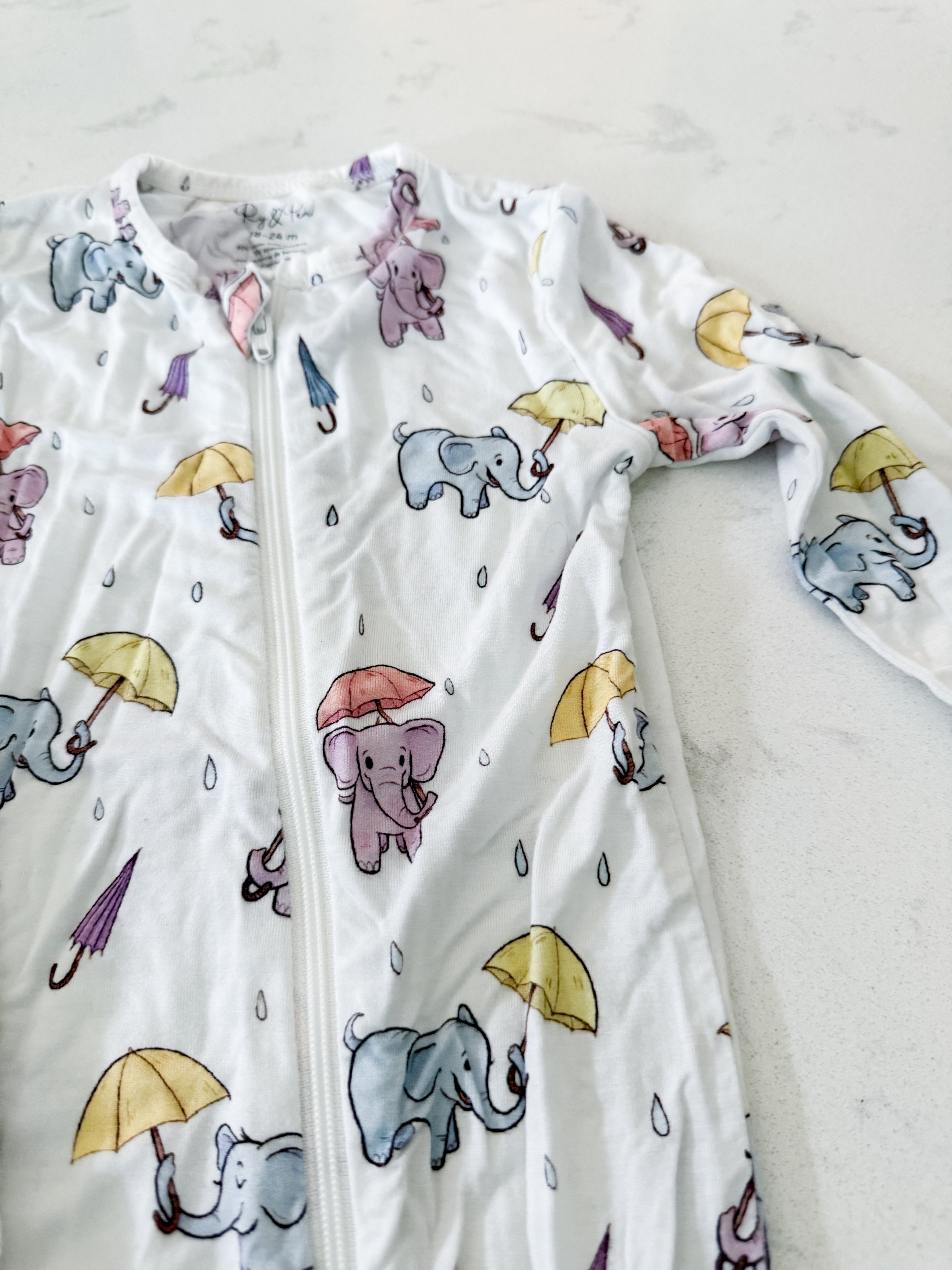 Ry and Pen- 18-24m- VGUC- white bamboo footless pajamas with elephants carrying umbrellas