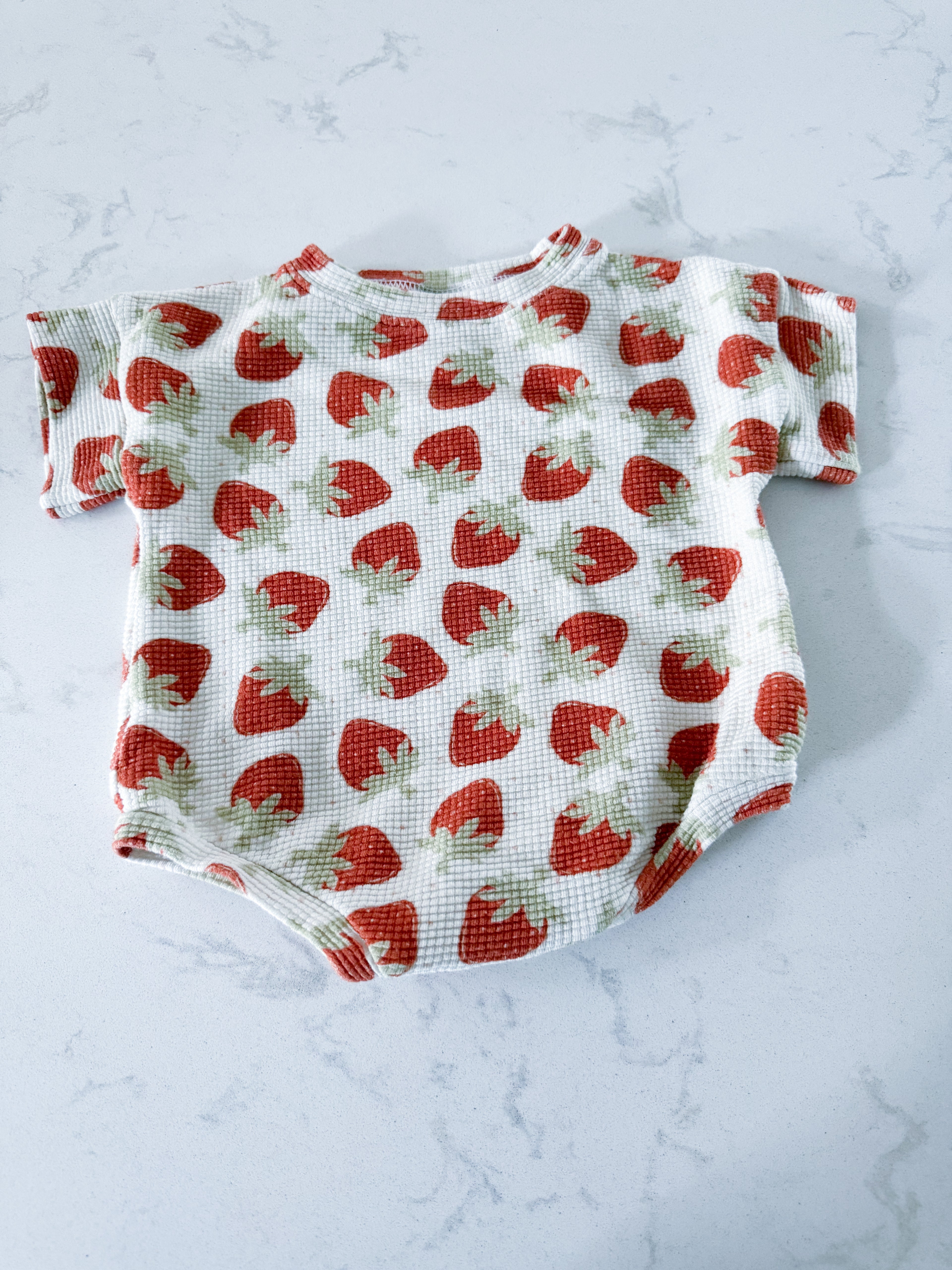 Dear Aspen- 6-9m- VGUC- white waffle knot rubble romper with strawberries
