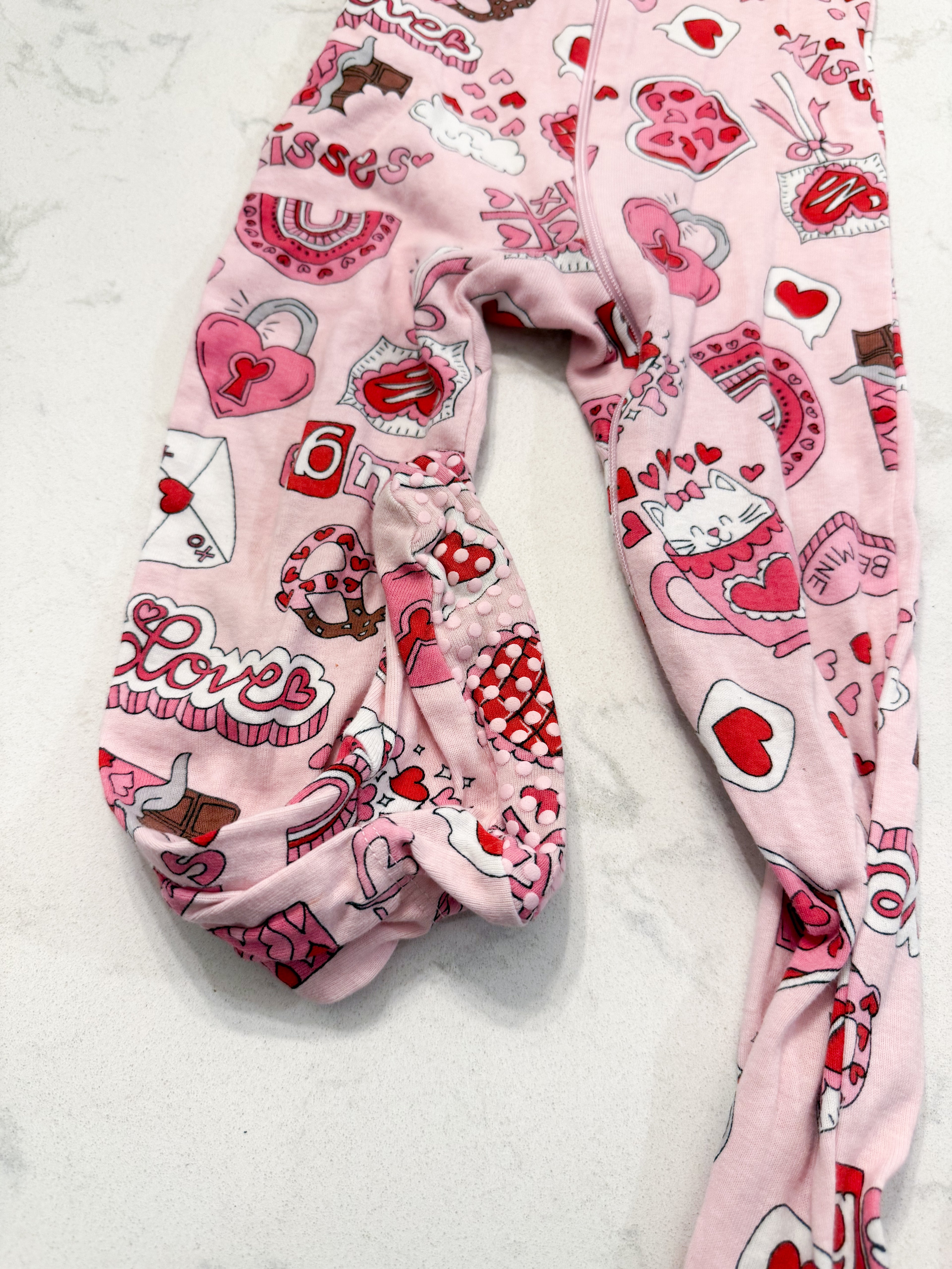 The Children’s Place- 2T- GUC- pink valentines footie pajamas with chocolates