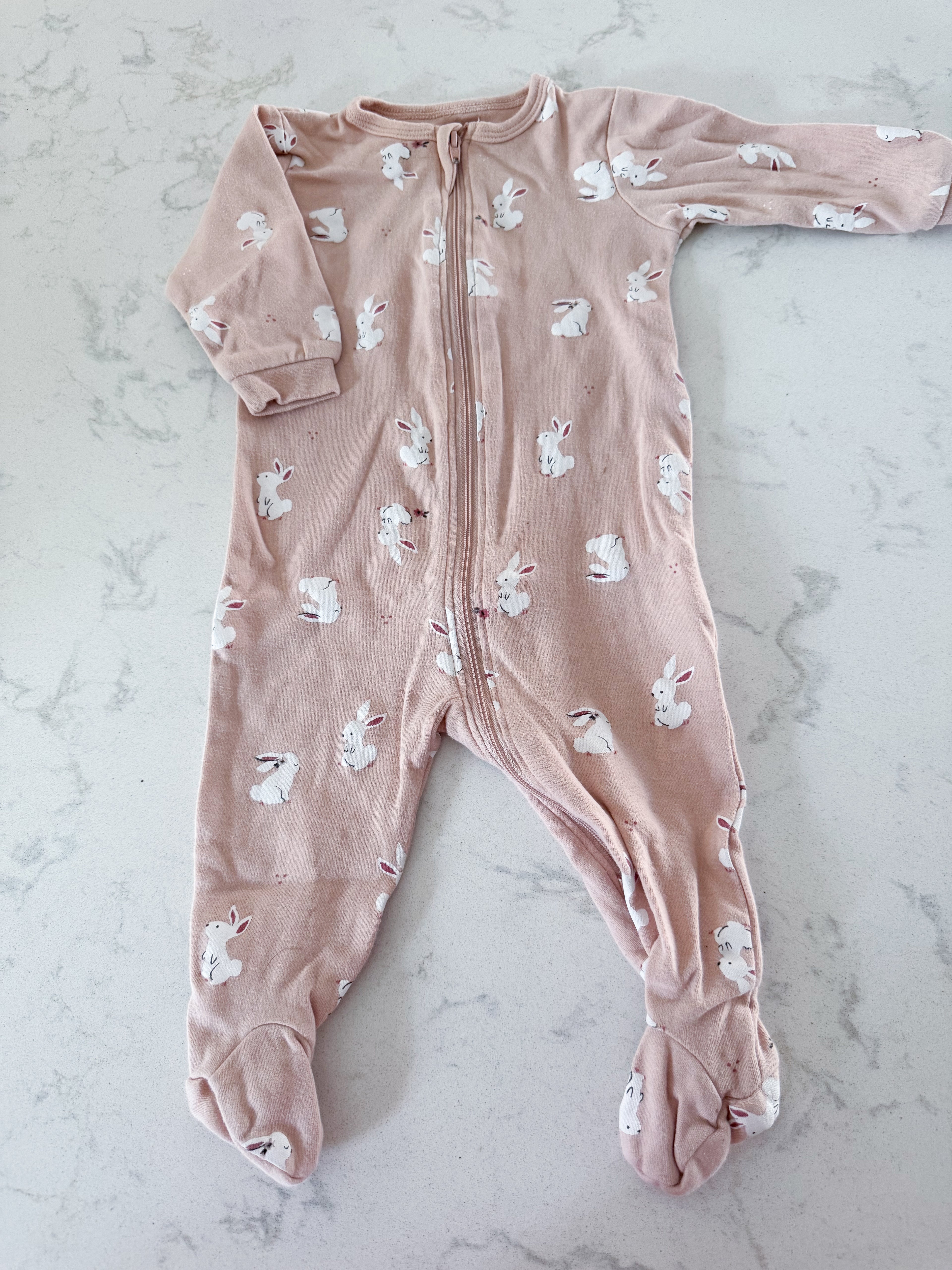 Petit lem- 6m- GUC- pinky beige with white bunnies zip up footie pajamas
