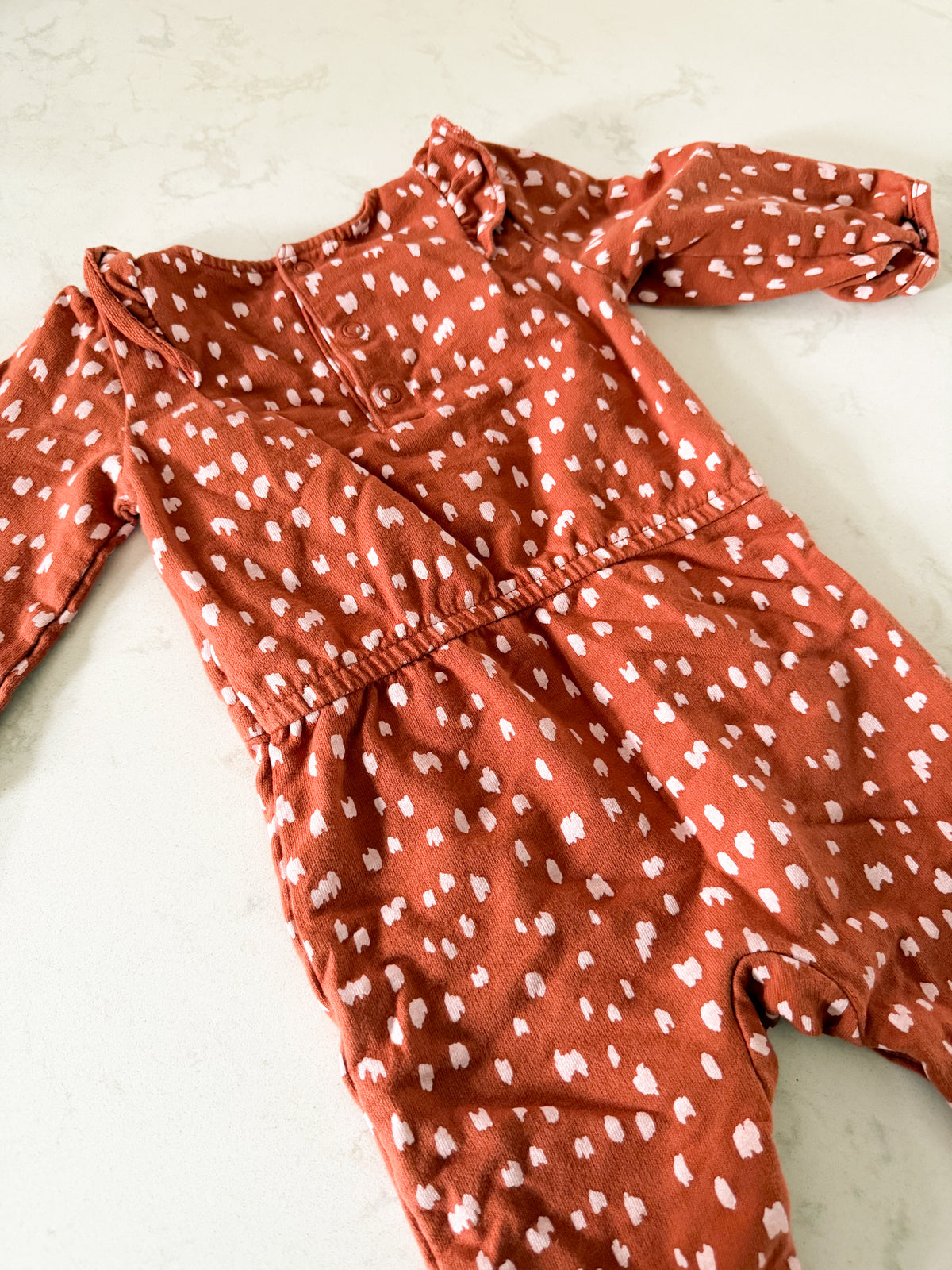 Carters- 6-12m- VGUC- rust brown romper with light pink dot pattern and ruffles