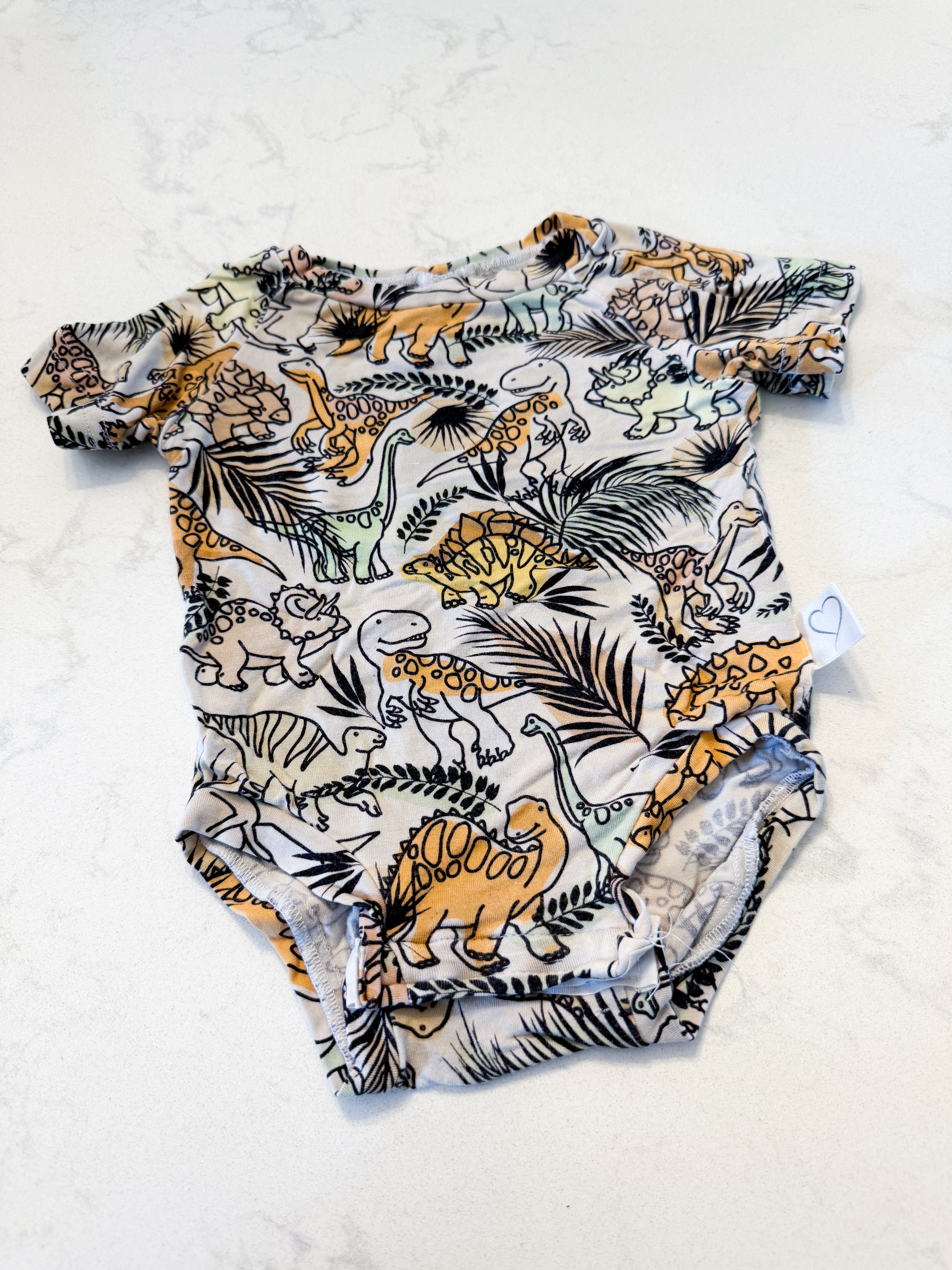Vi and Jax- 0-6m- GUC- beige short sleeve bodysuit with dinosaur pattern