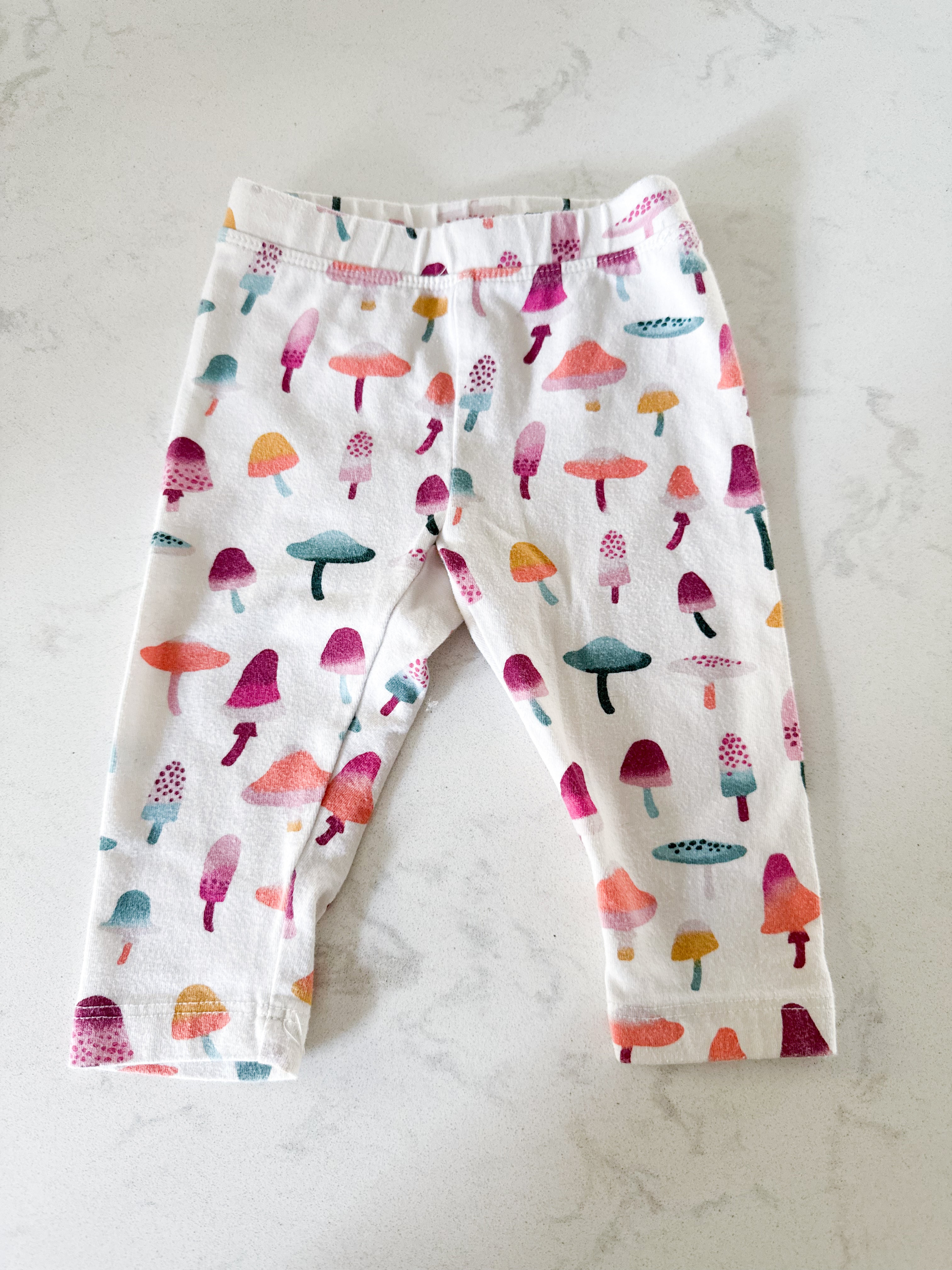 Gymboree- 3-6m- GUC- white leggings with colourful mushrooms