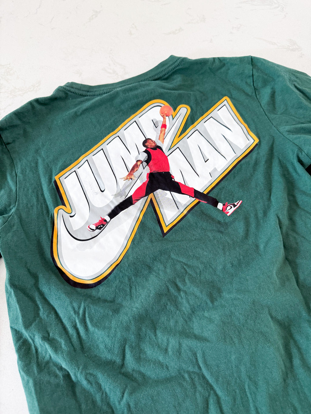 Air Jordan- 12-13Y- PLAY- Forest green long sleeve shirt with jump man Air Jordan logo on back and front
