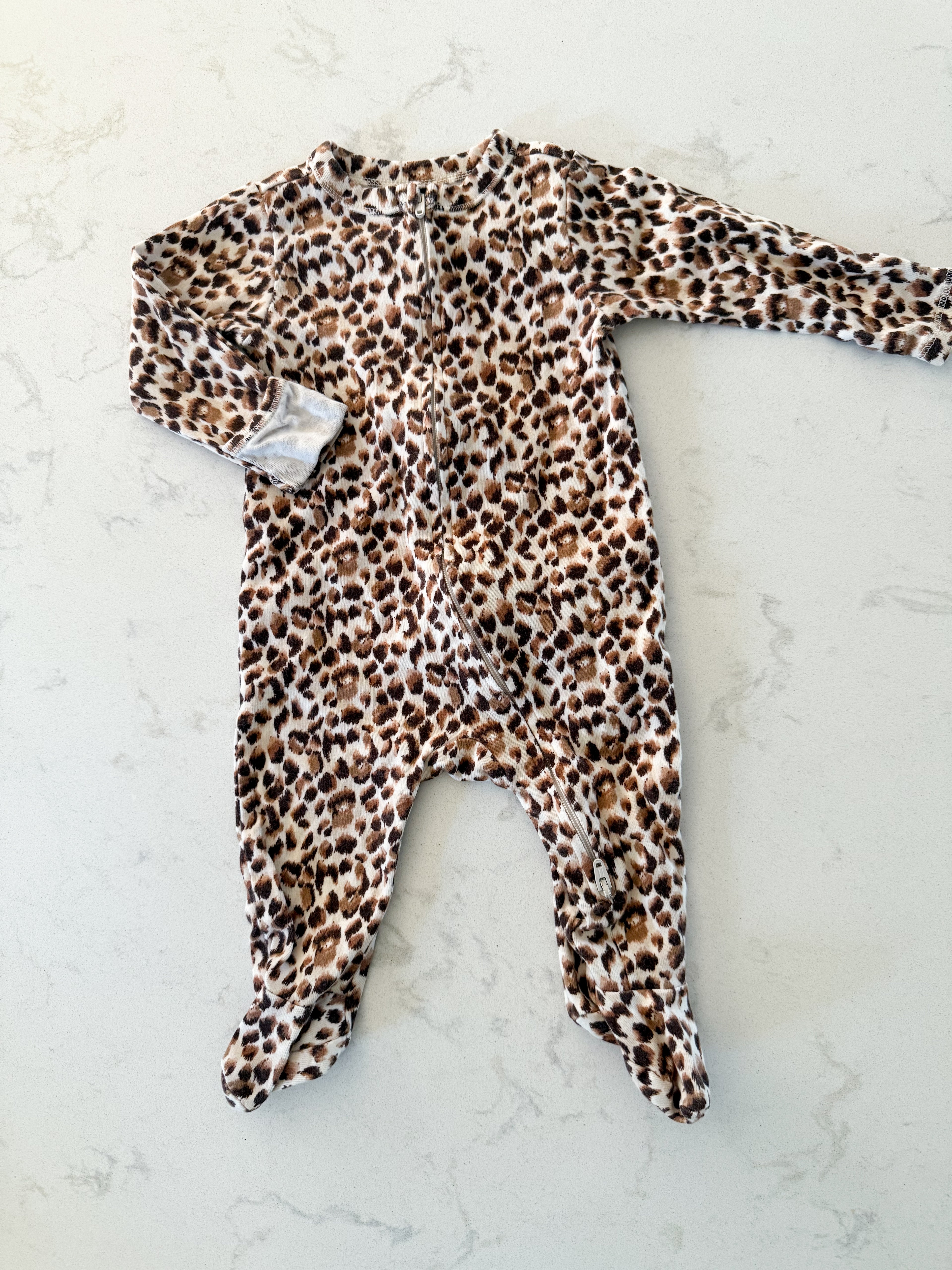 Old Navy- 3-6m- VGUC- cheetah print zip up footie pajamas