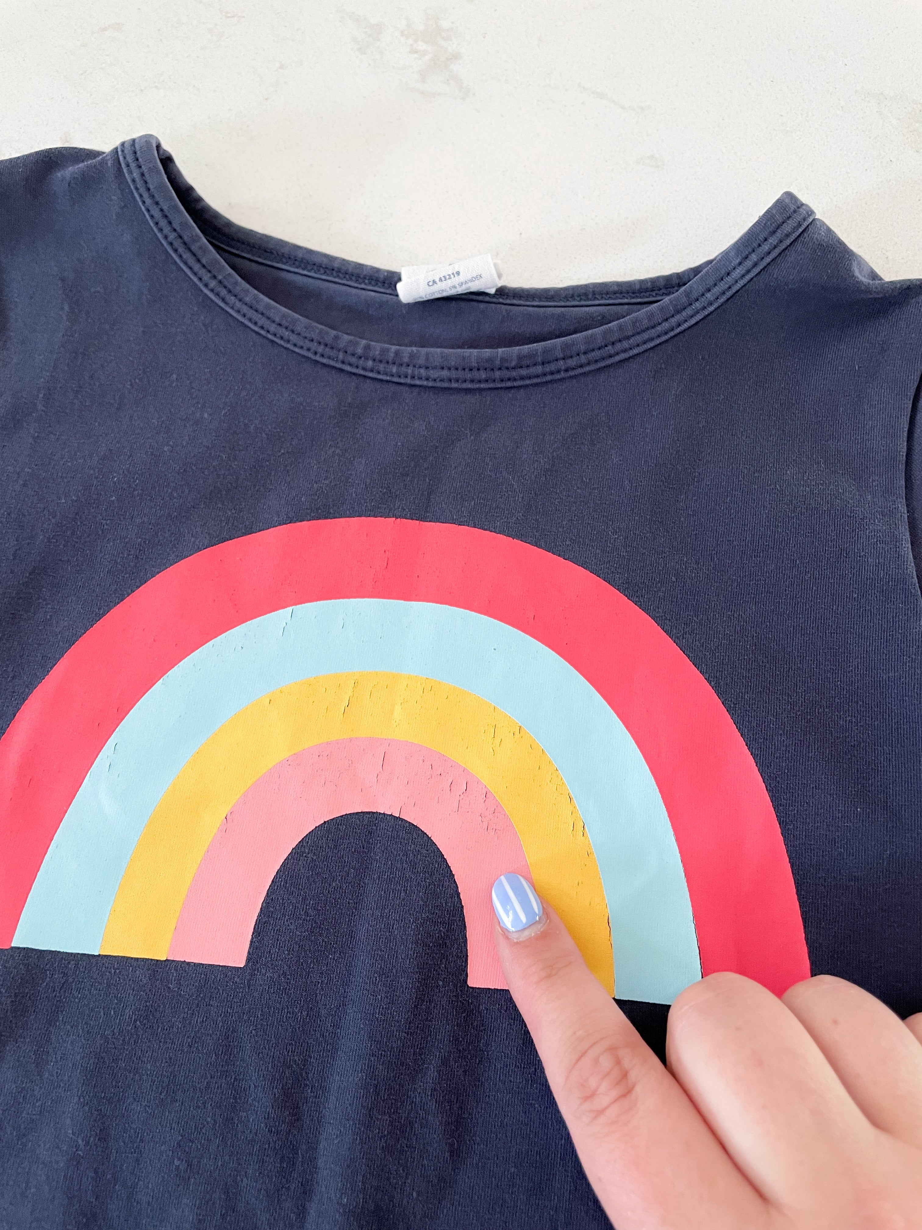 Peekaboo Beans- 6Y- navy blue shirt with rainbow graphic