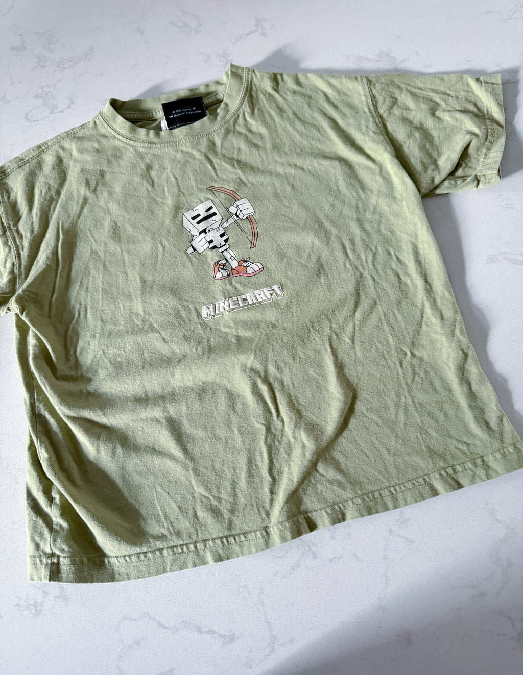 Zara- 8-9Y- GUC- green short t shirt with Minecraft graphics