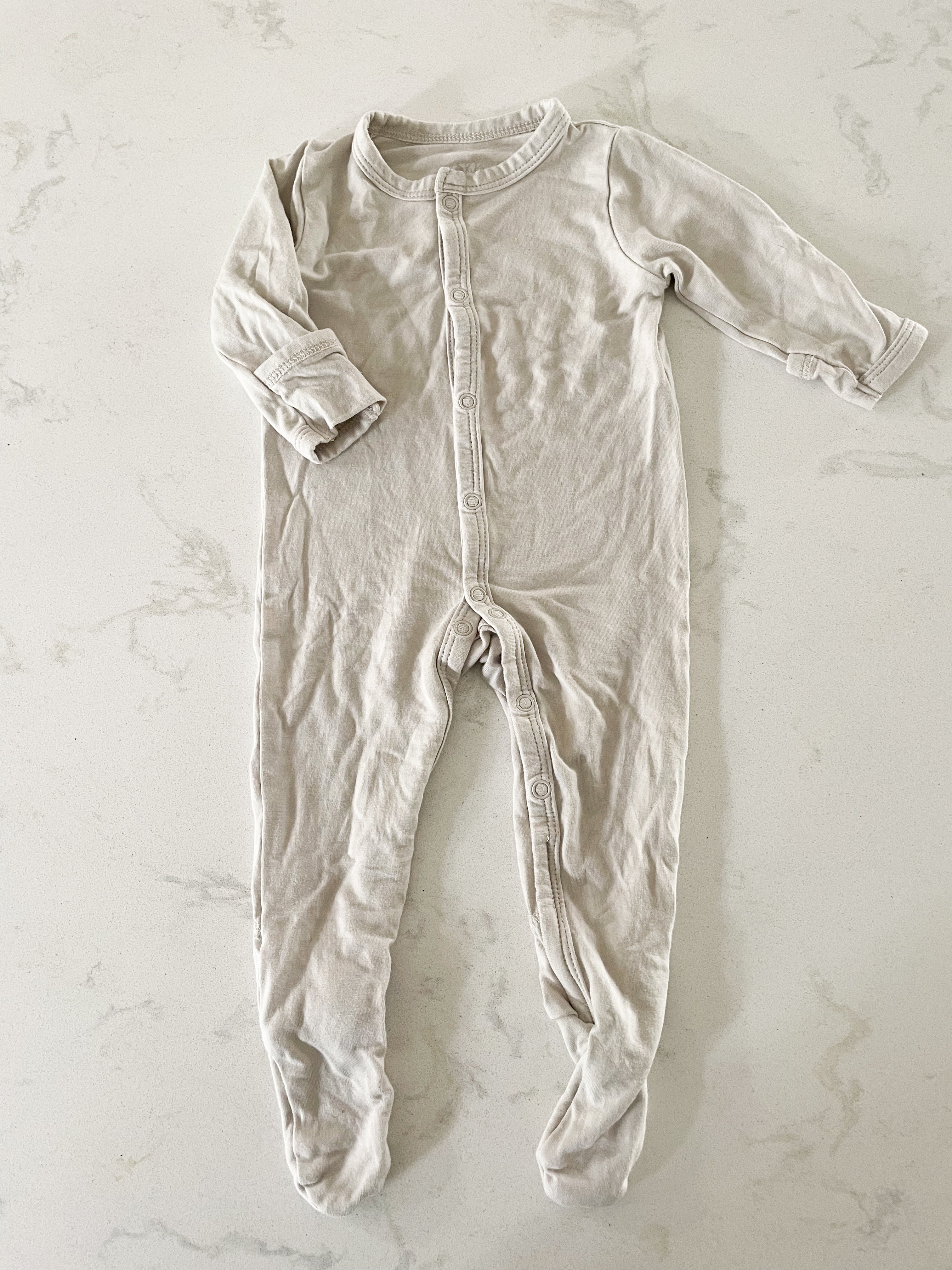 Kyte Baby- 0-3 months- bamboo snap footie pajamas beige