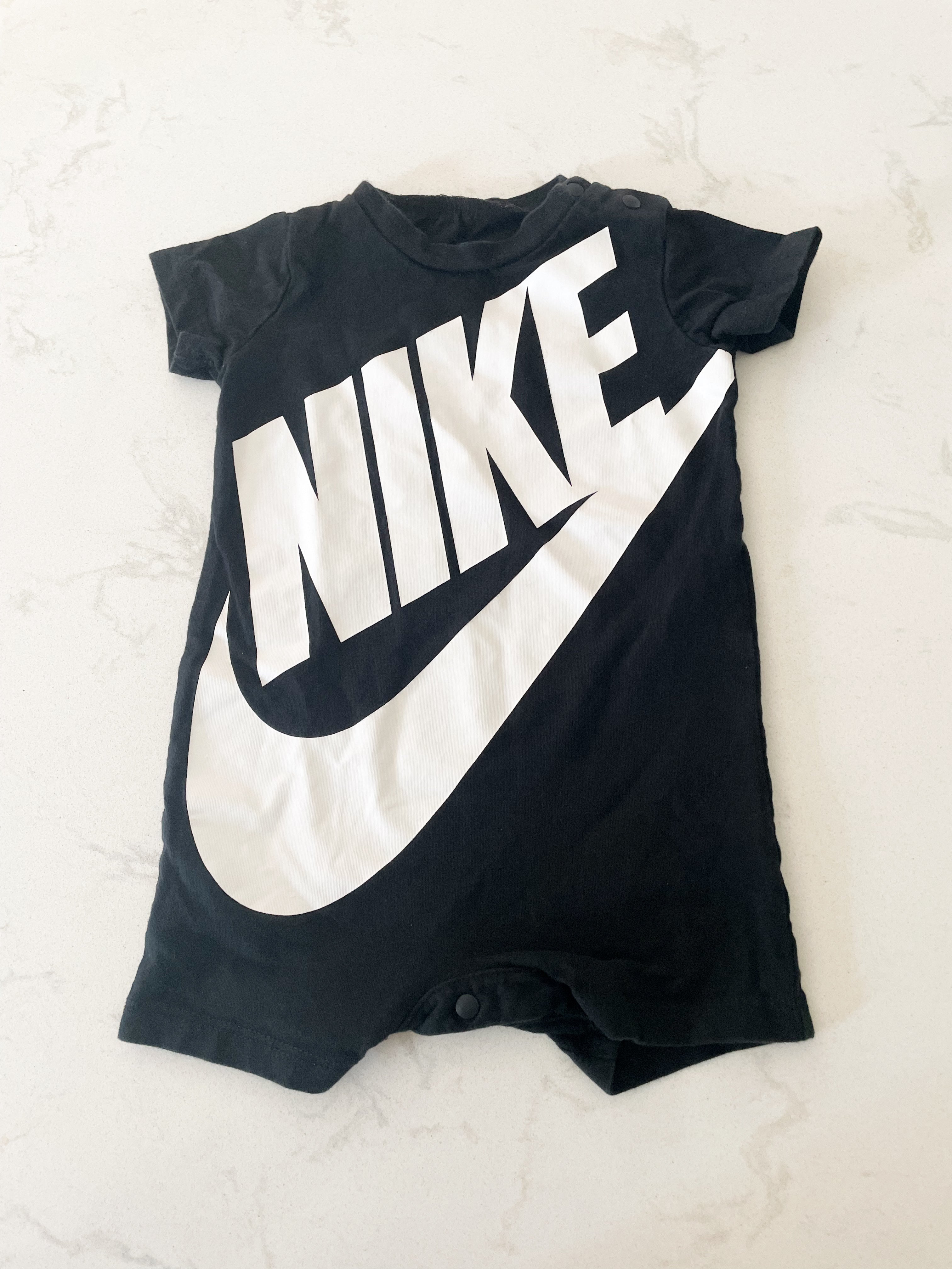 Nike- 6 months- shorts romper with white Nike on front
