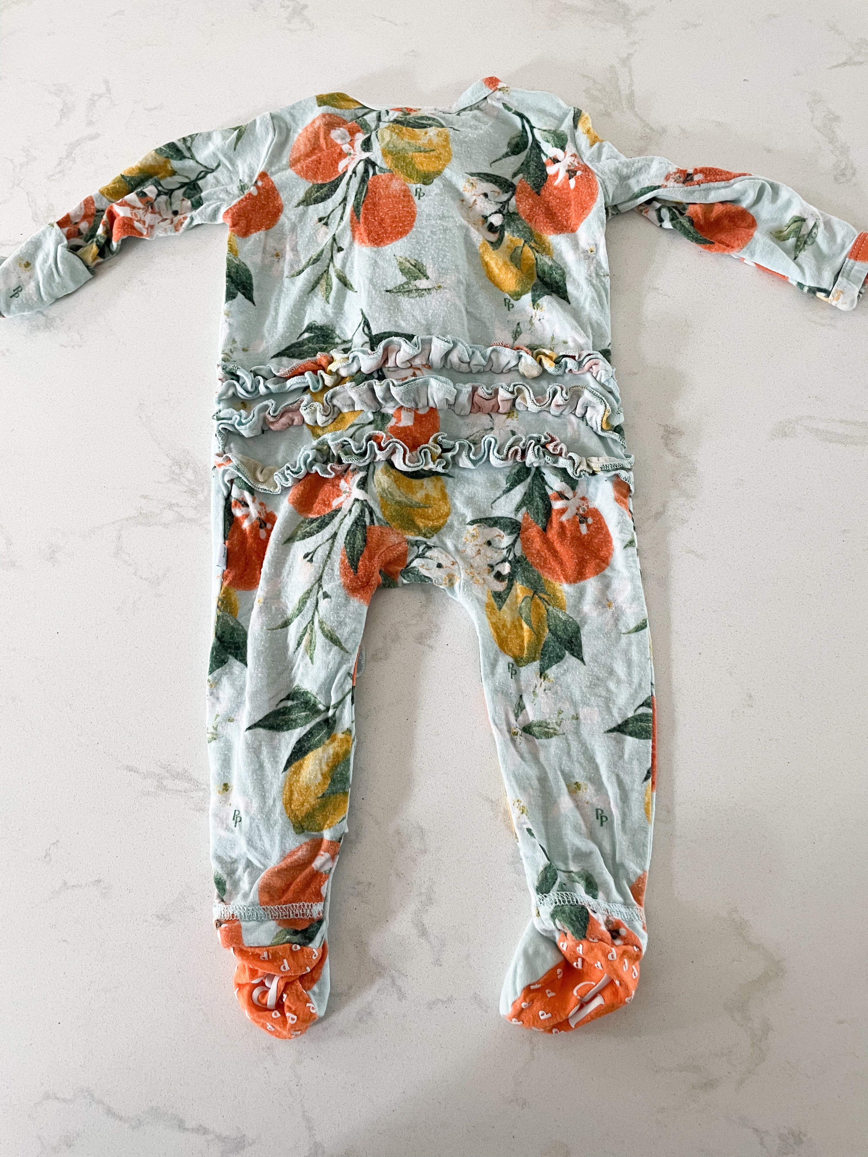 Posh Peanut- Newborn- bamboo citrus footie pajamas with ruffles