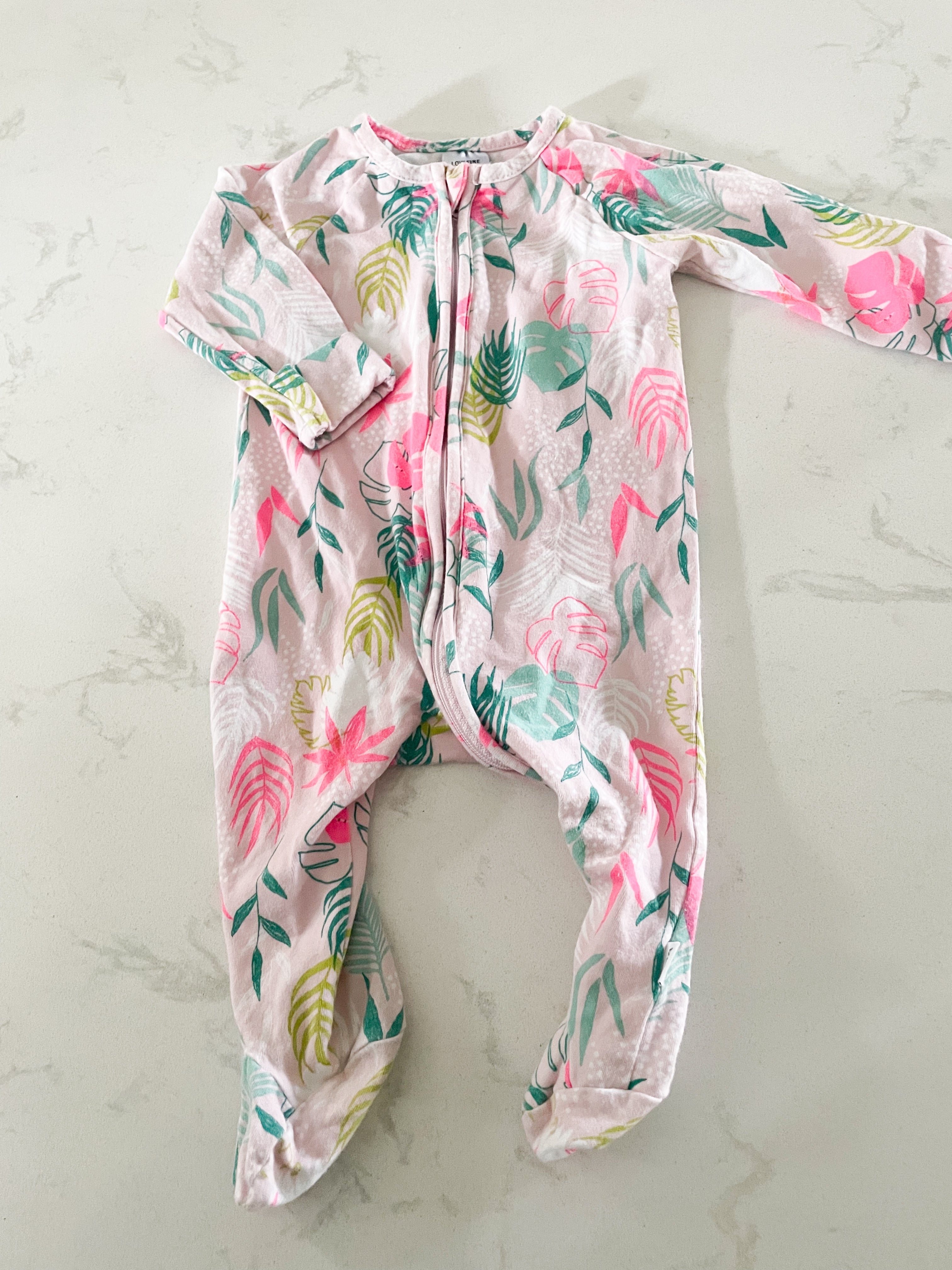 Target- 3-6 months- light pink footie zippy with tropical neon leaves