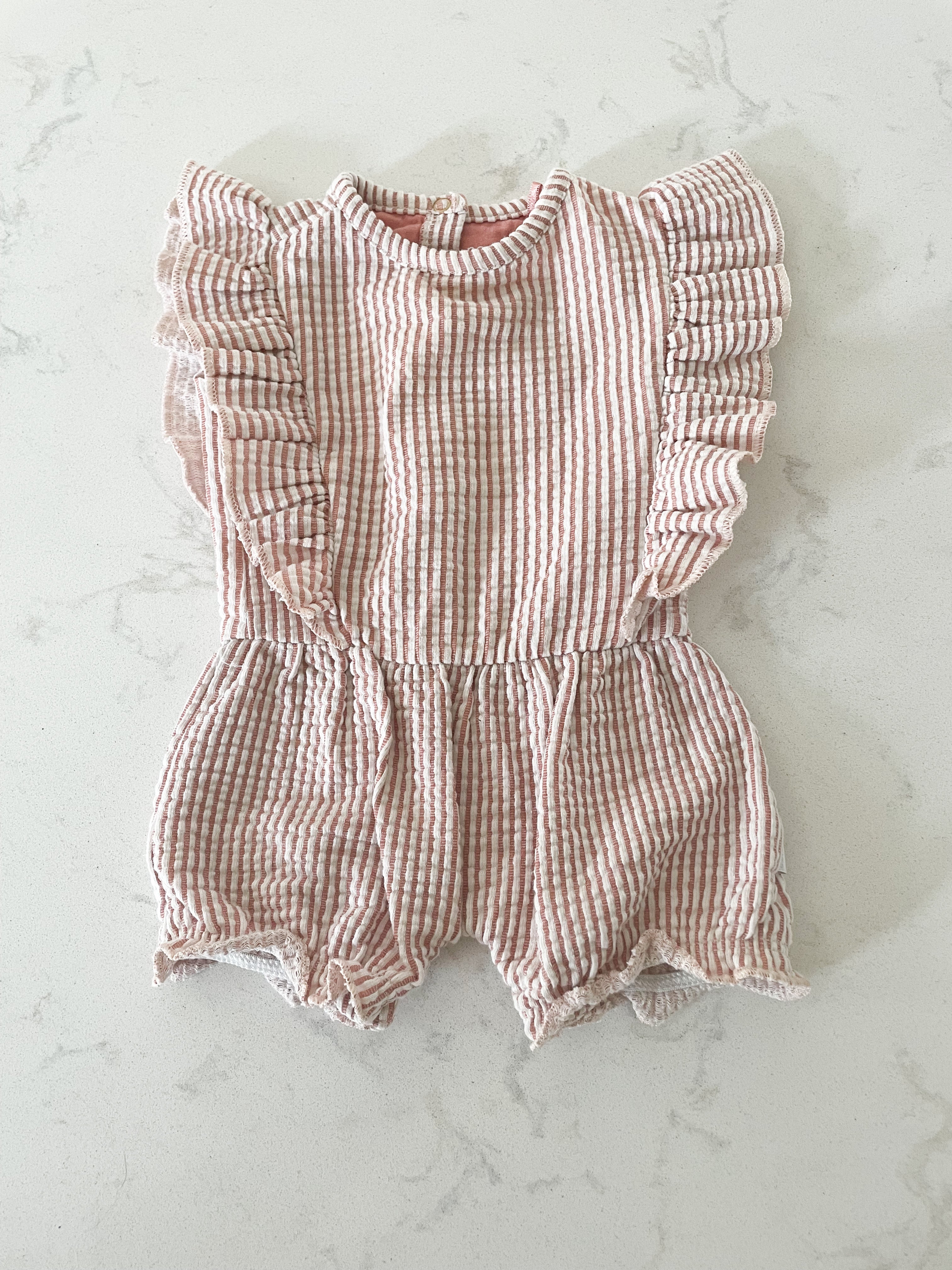 Noppies- 1-2 months- dusty pink and white striped shorts romper with ruffles