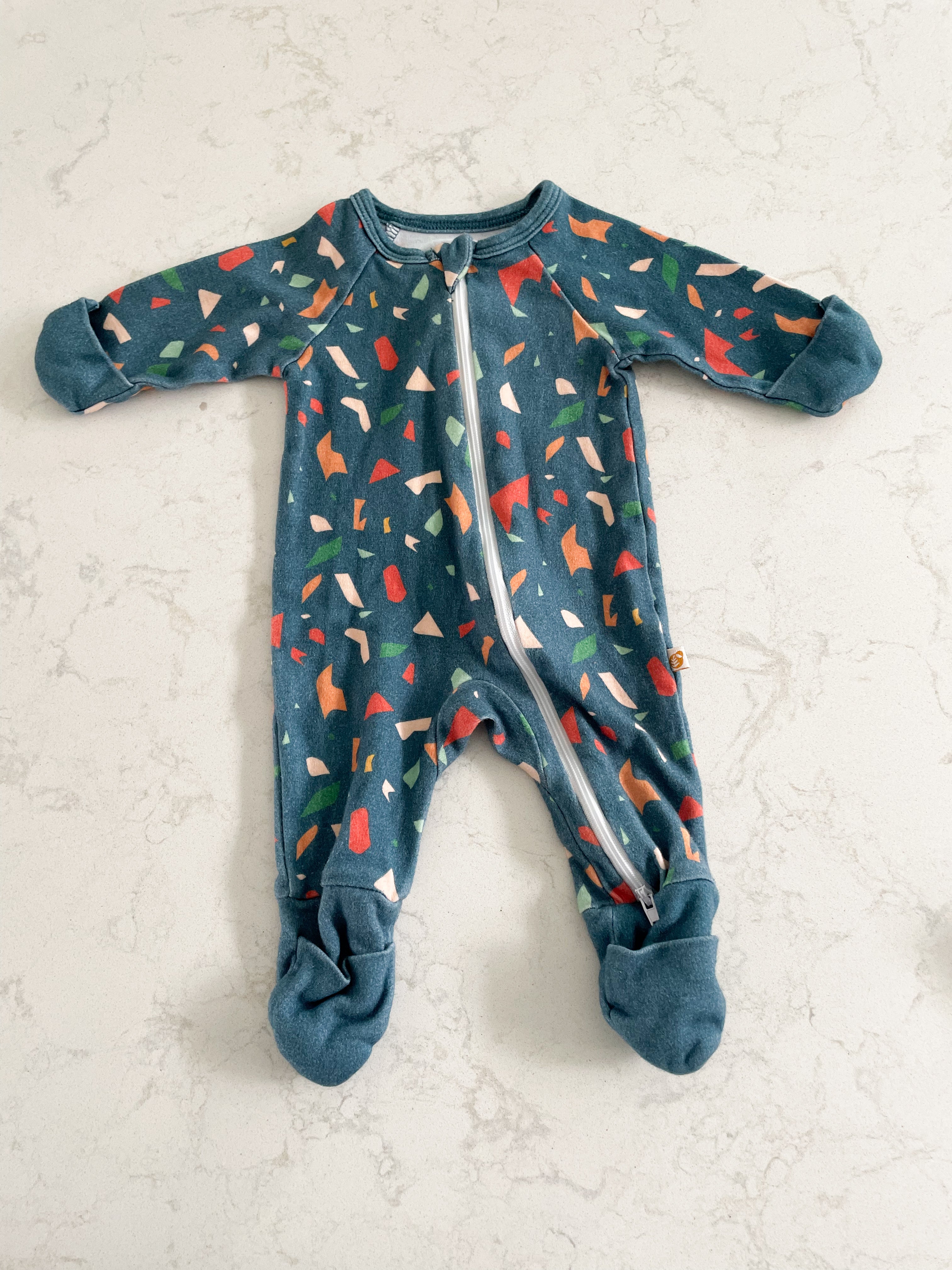 Tiny Kinfolk- 0-3 months- blue zipper pajamas with multi coloured stone shapes