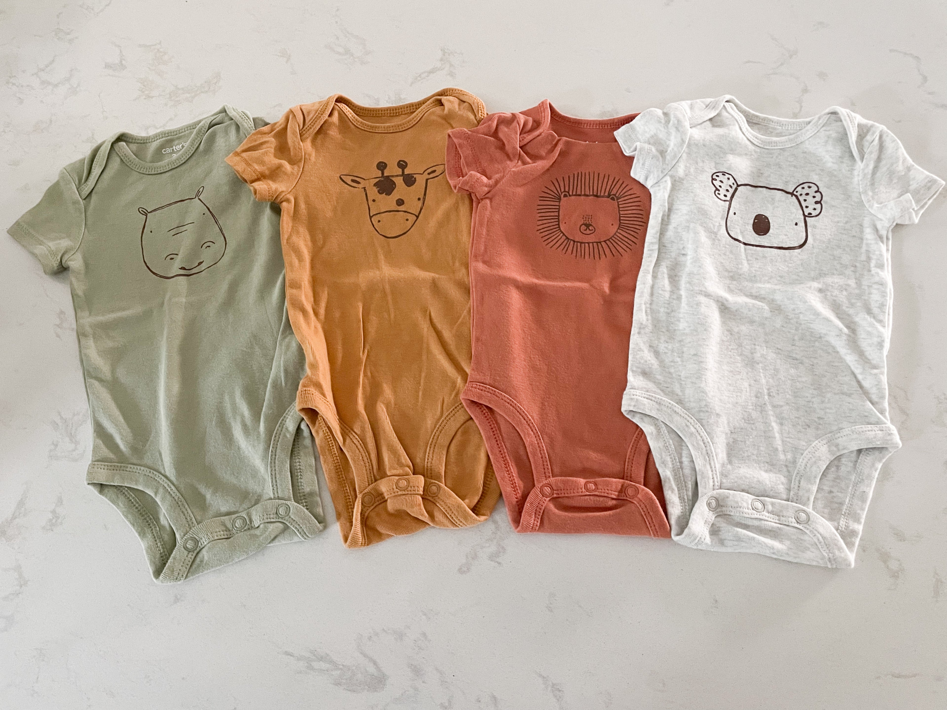 Carter’s- 3 months- 4 pack of animal short sleeve onesies