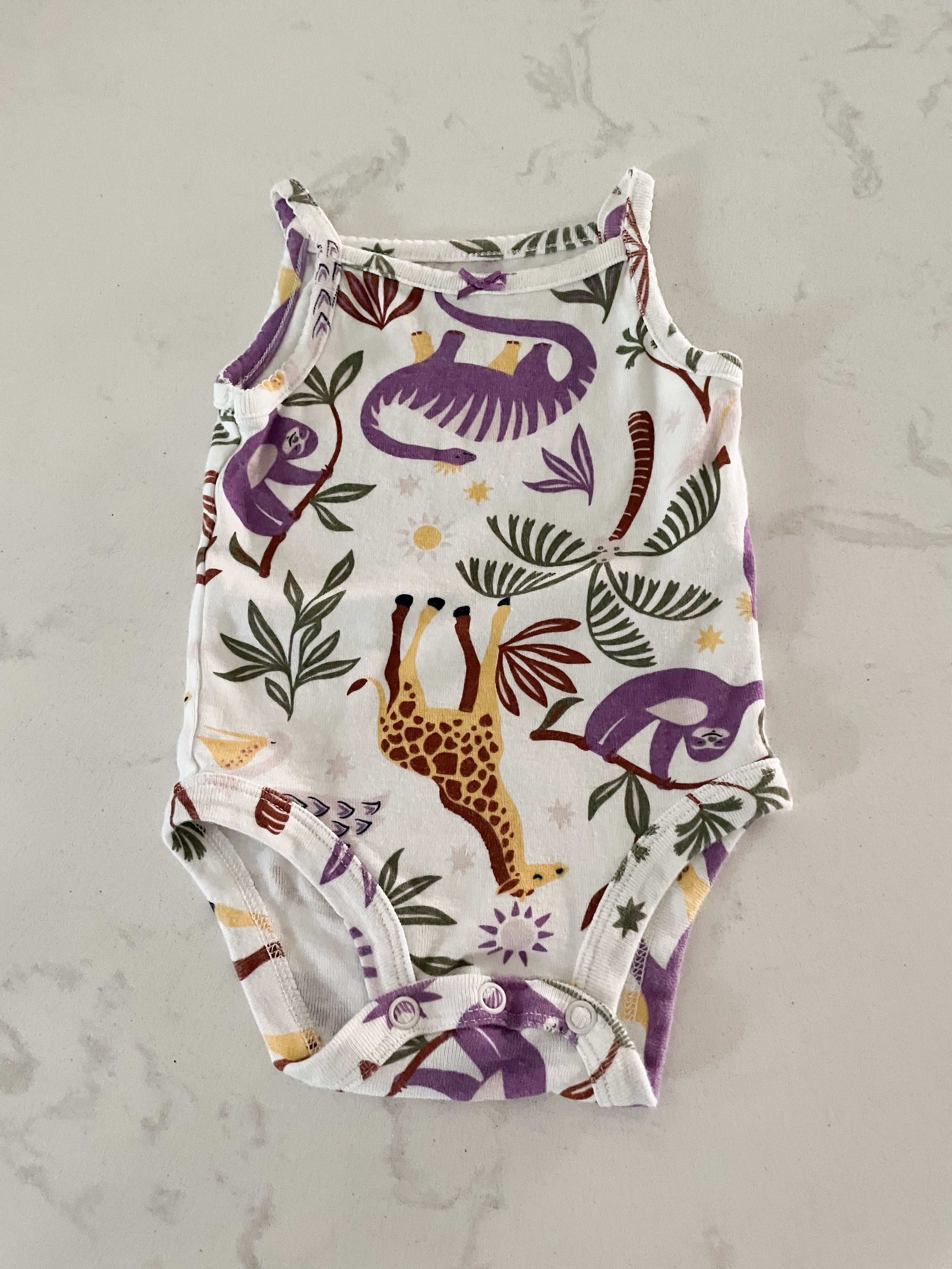 Carter’s- 3 months- white tank bodysuit with purple dinosaurs