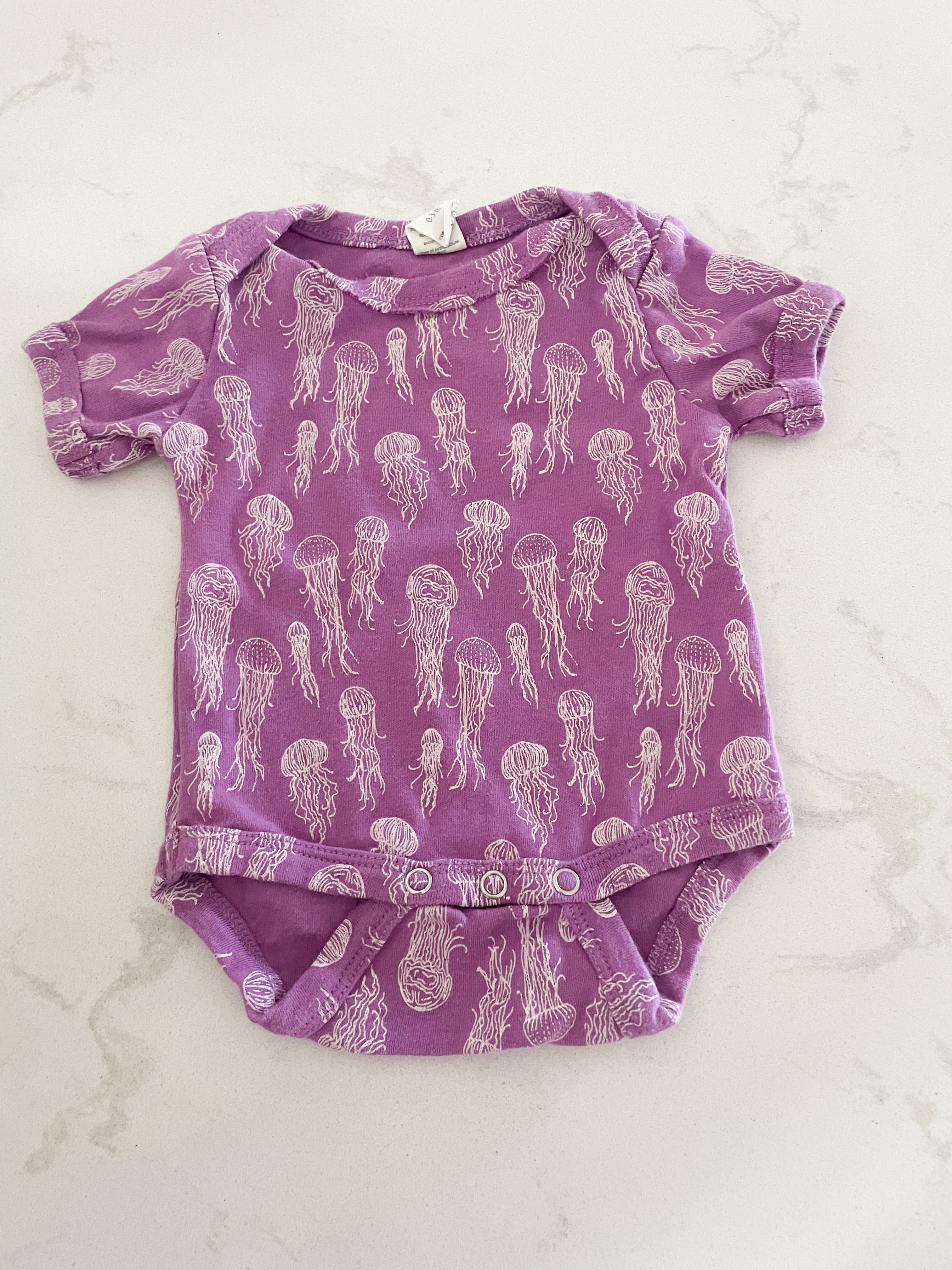 Kate Quinn- 0-3 months- purple jellyfish short sleeve bodysuit