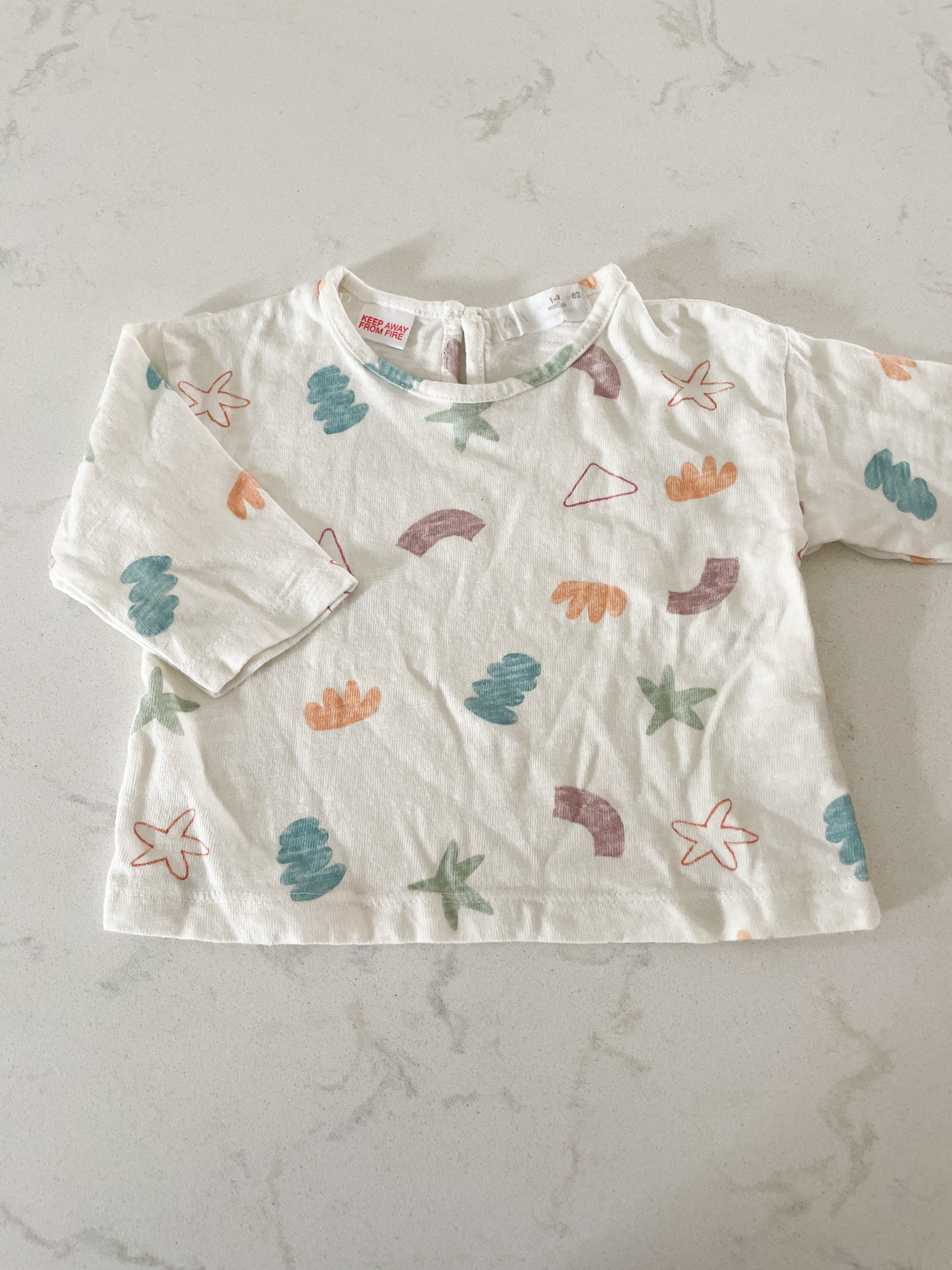 Zara- 1-3 months- white long sleeve shirt with shapes on front