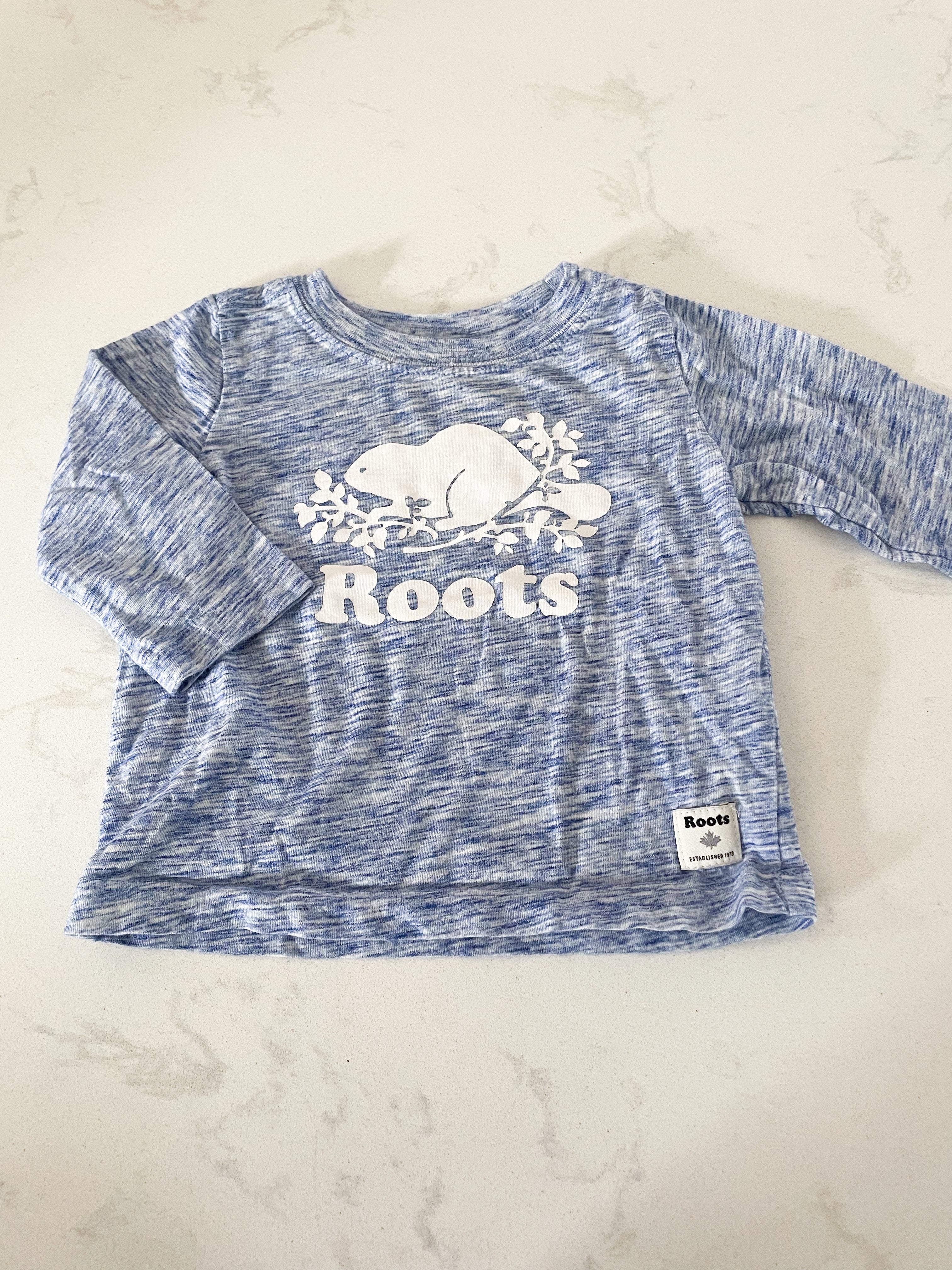 Roots- 3-6 months- long sleeve blue shirt with white logo
