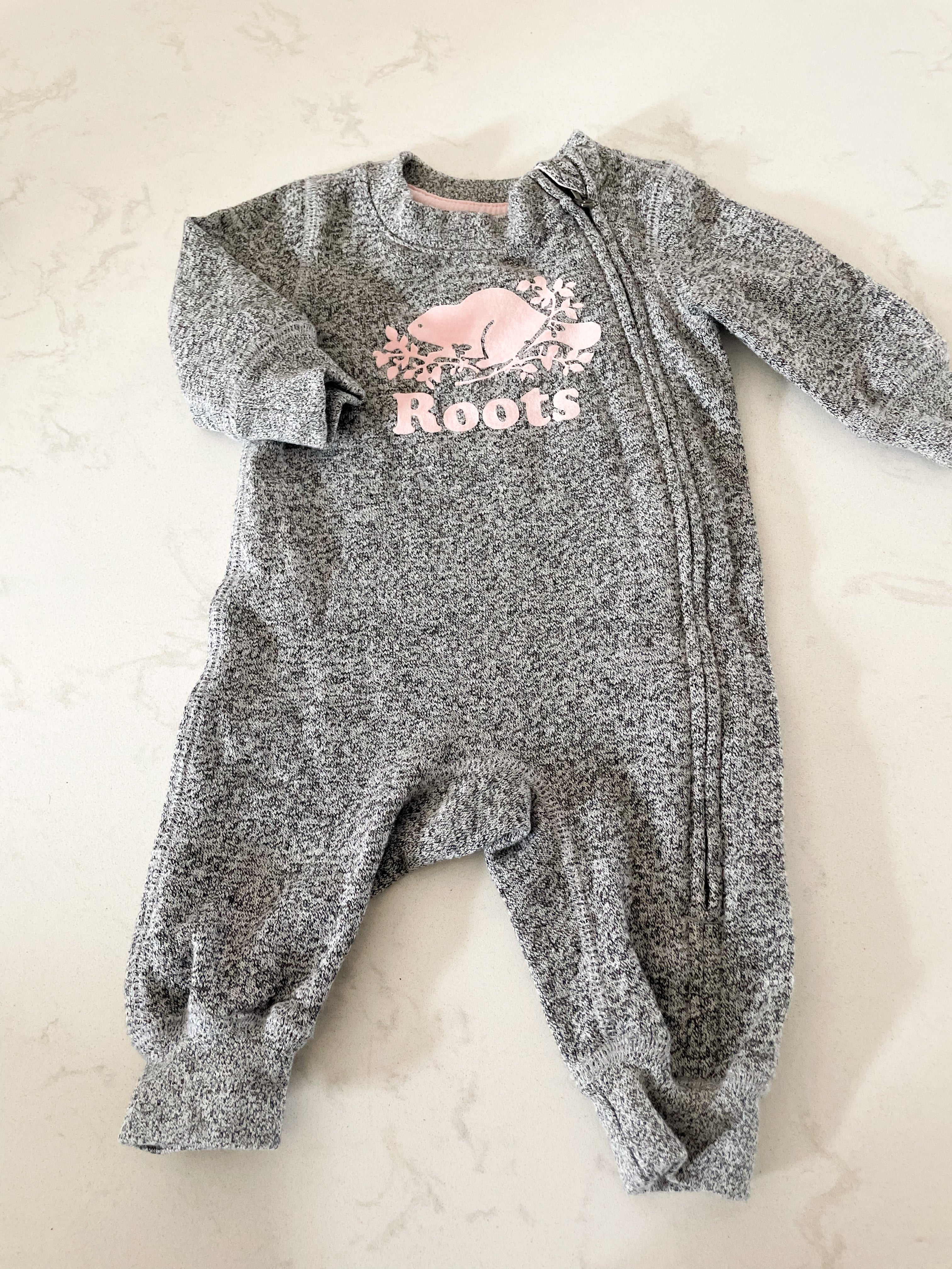Roots- 0-3 months- grey speckled sweatsuit with pink logo