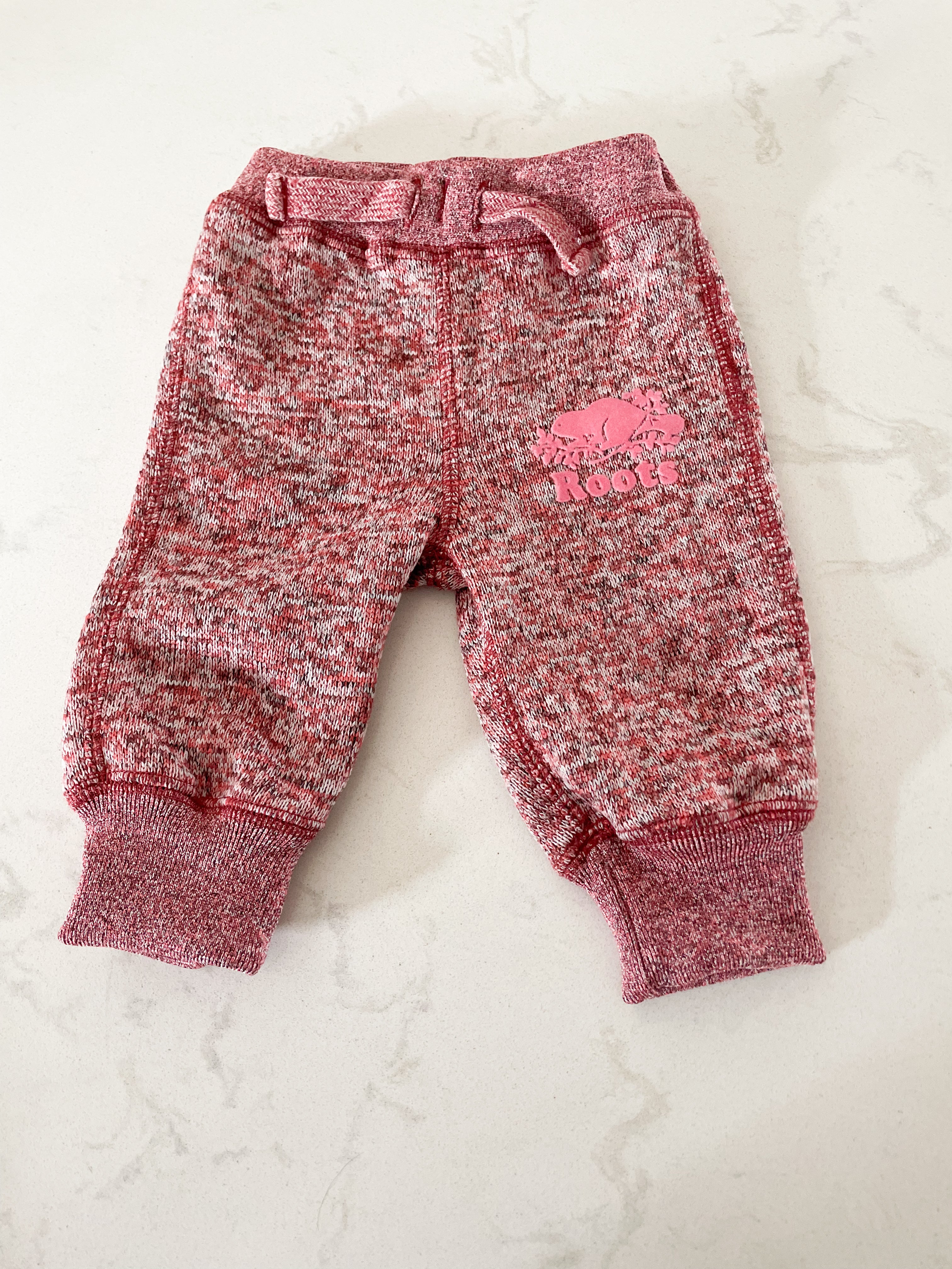 Roots- 3-6 months- light red sweat pants with pink logo